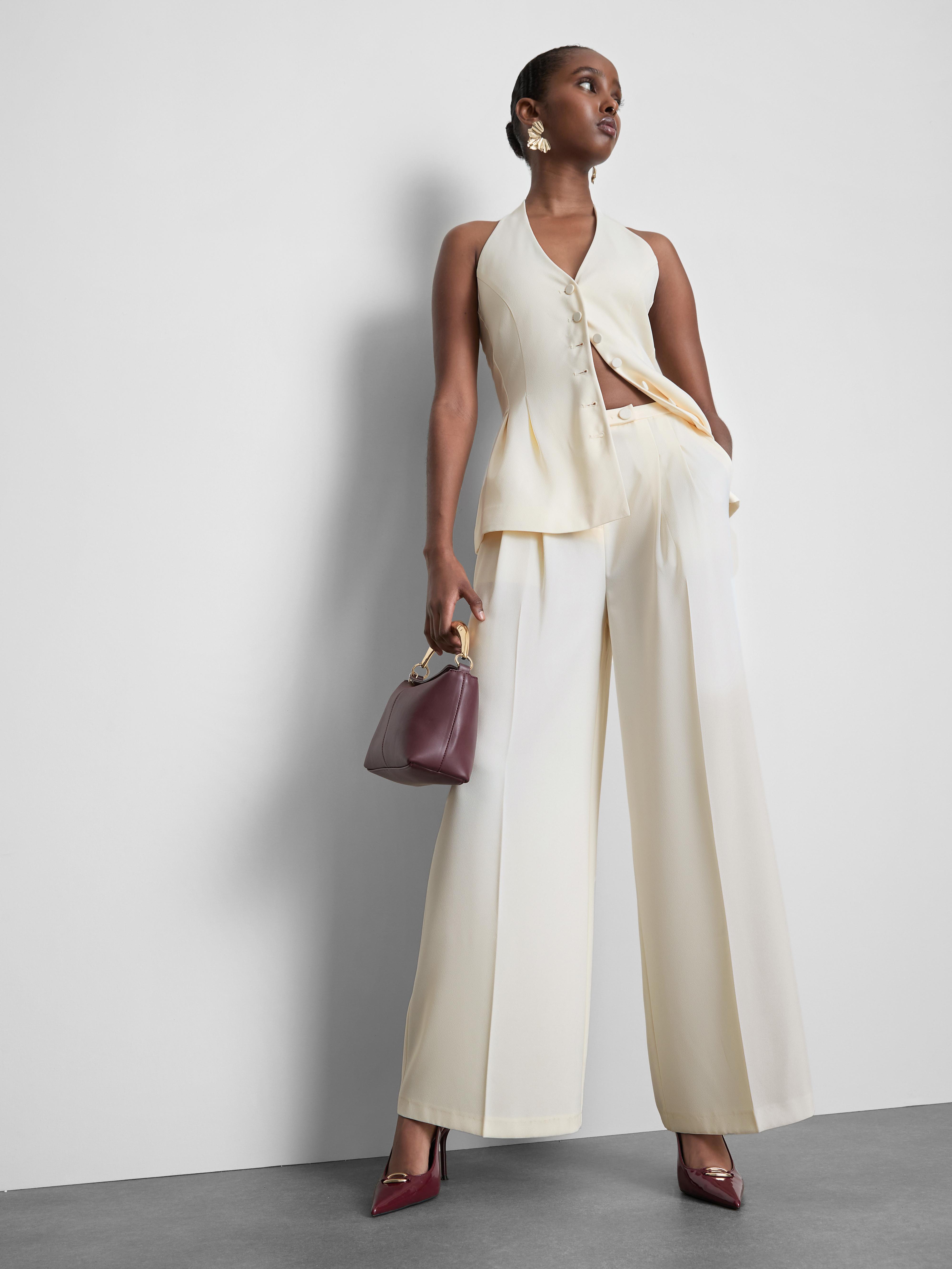 Pantalones de satén plisados de pernera ancha