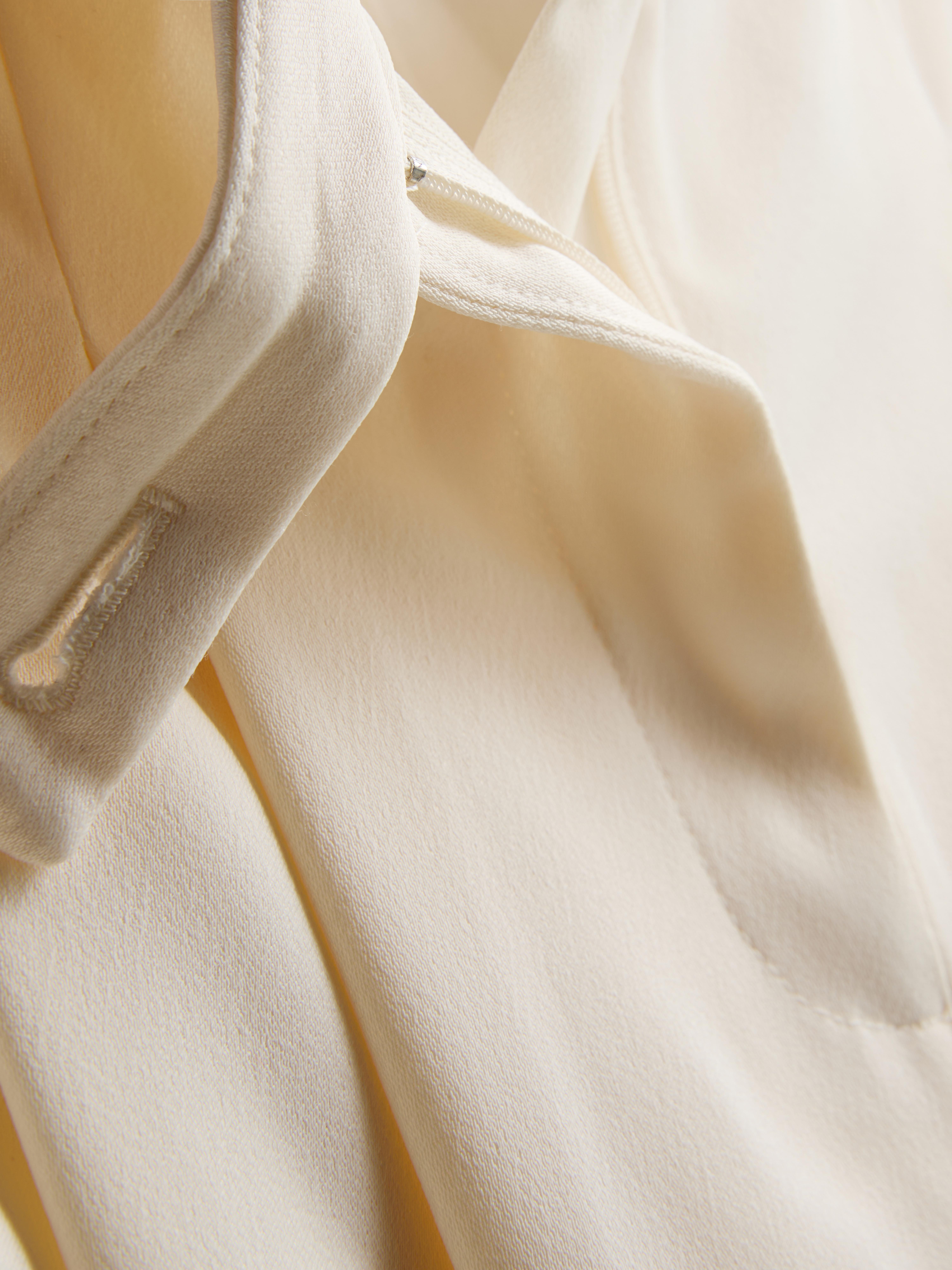 Pantalones de satén plisados de pernera ancha