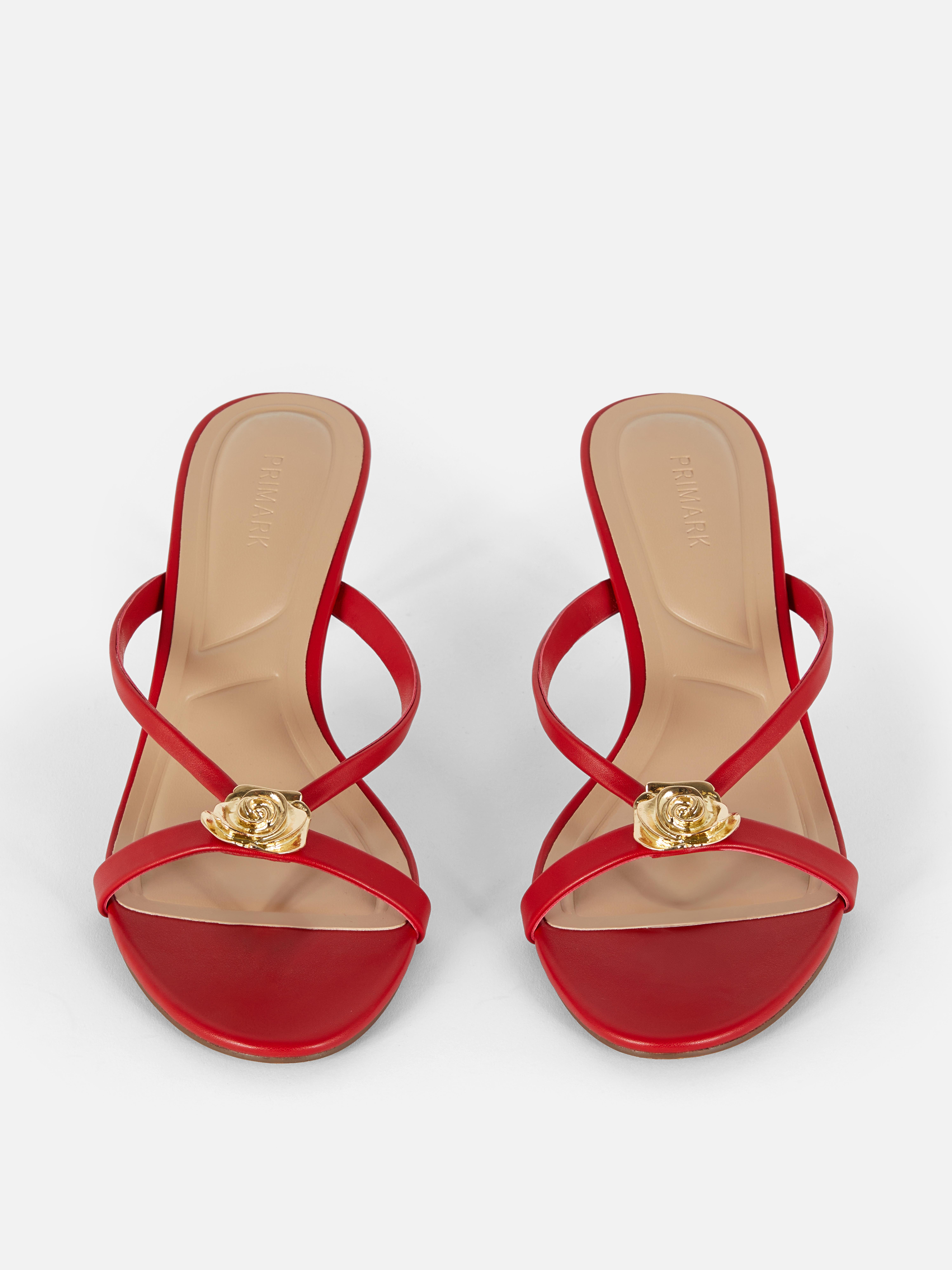 Mules mit Kitten-Heels und edlem Metalldetail