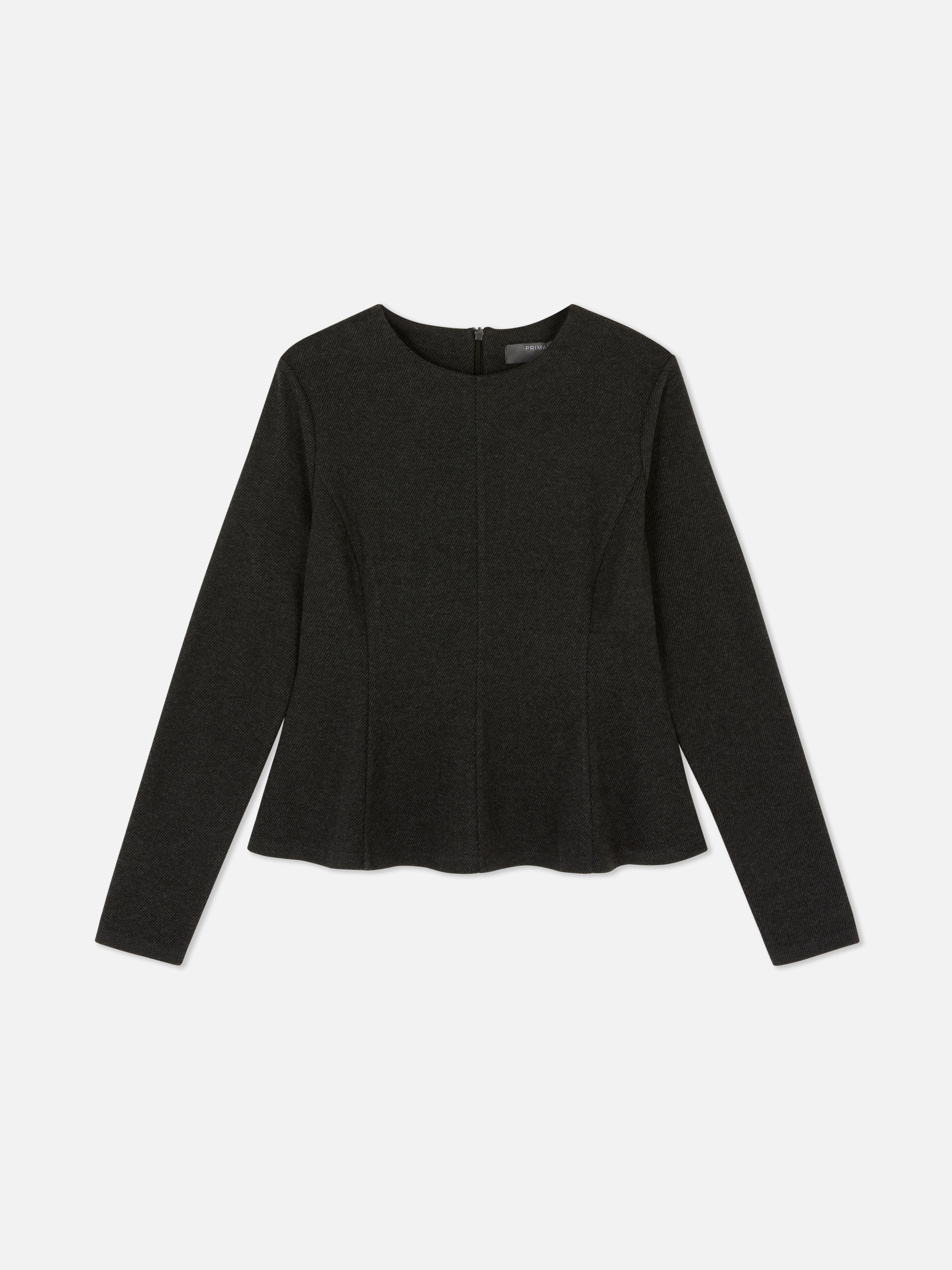 Top in peplum a maniche lunghe