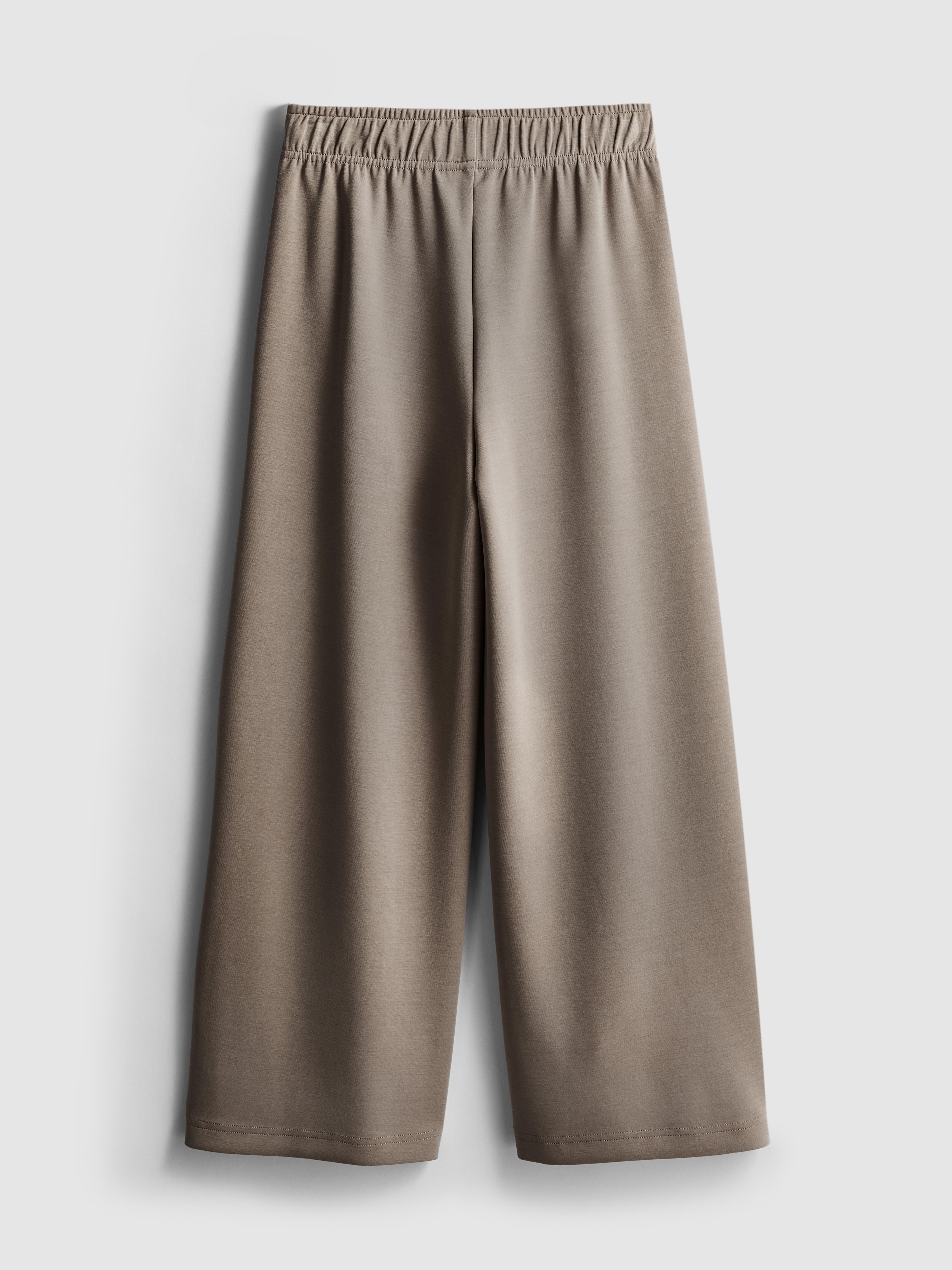 7-15 anos | Calças treino lavagem corte perna larga