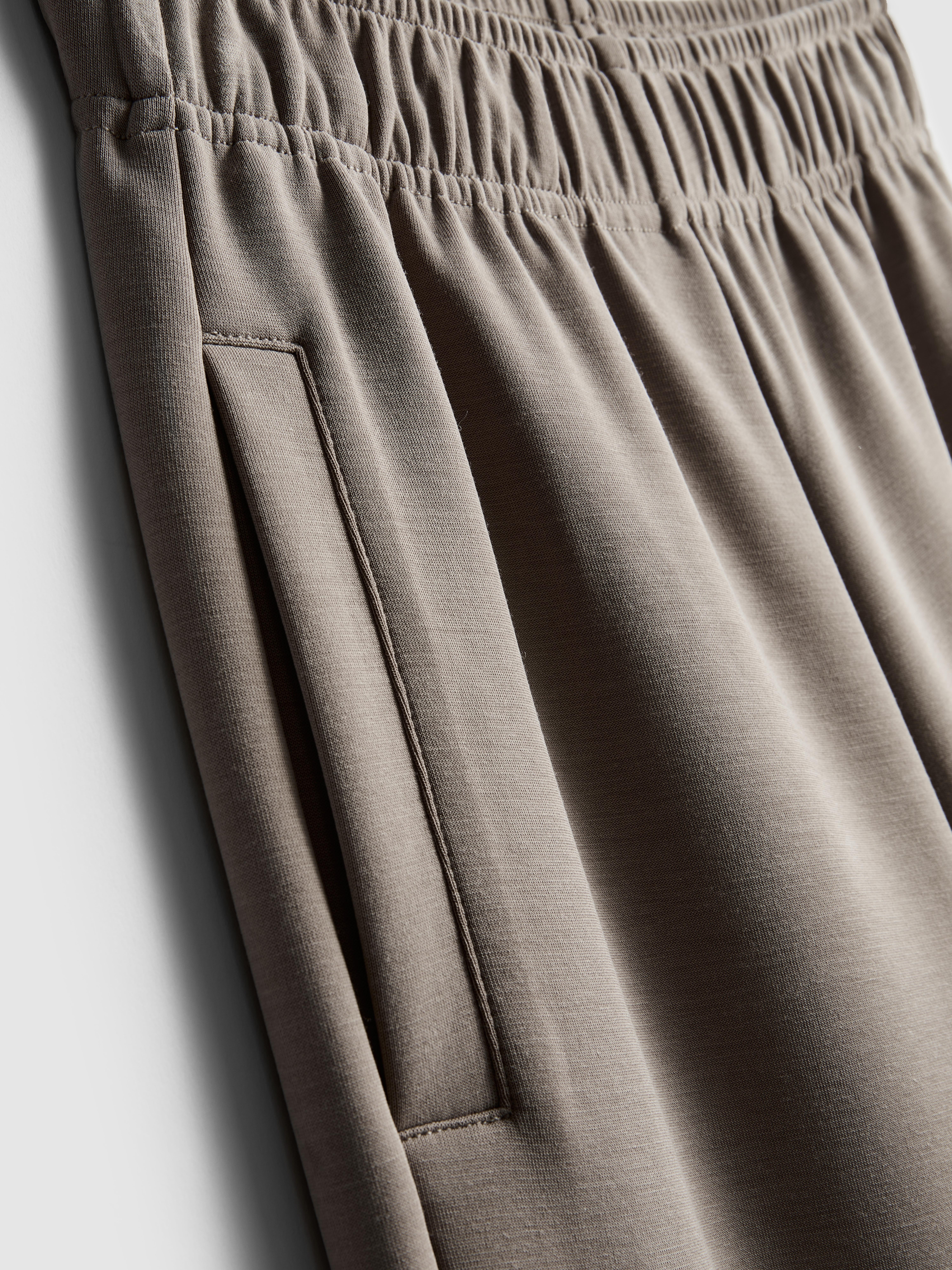 7-15 anos | Calças treino lavagem corte perna larga