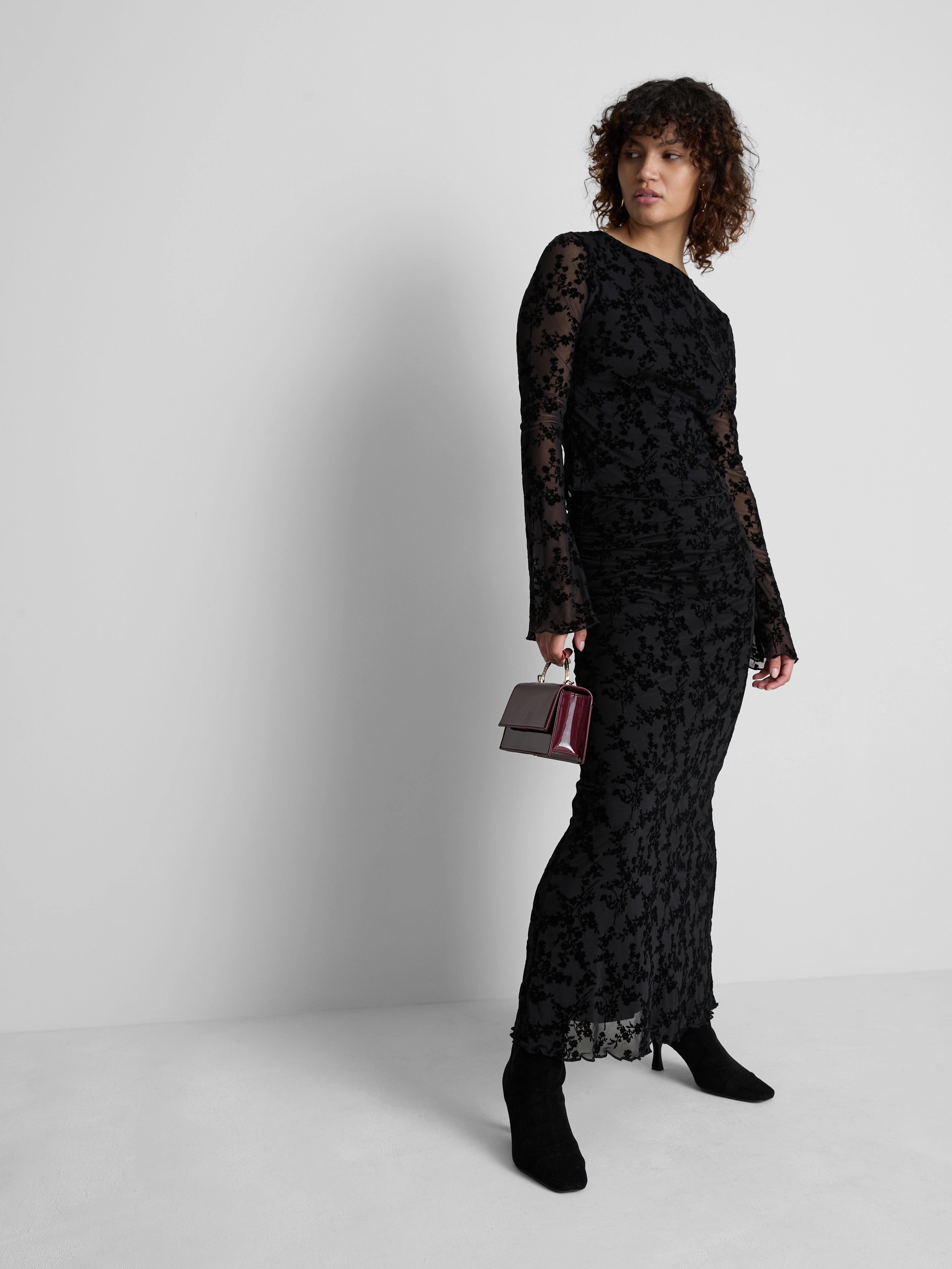 Top de manga larga en devoré floral