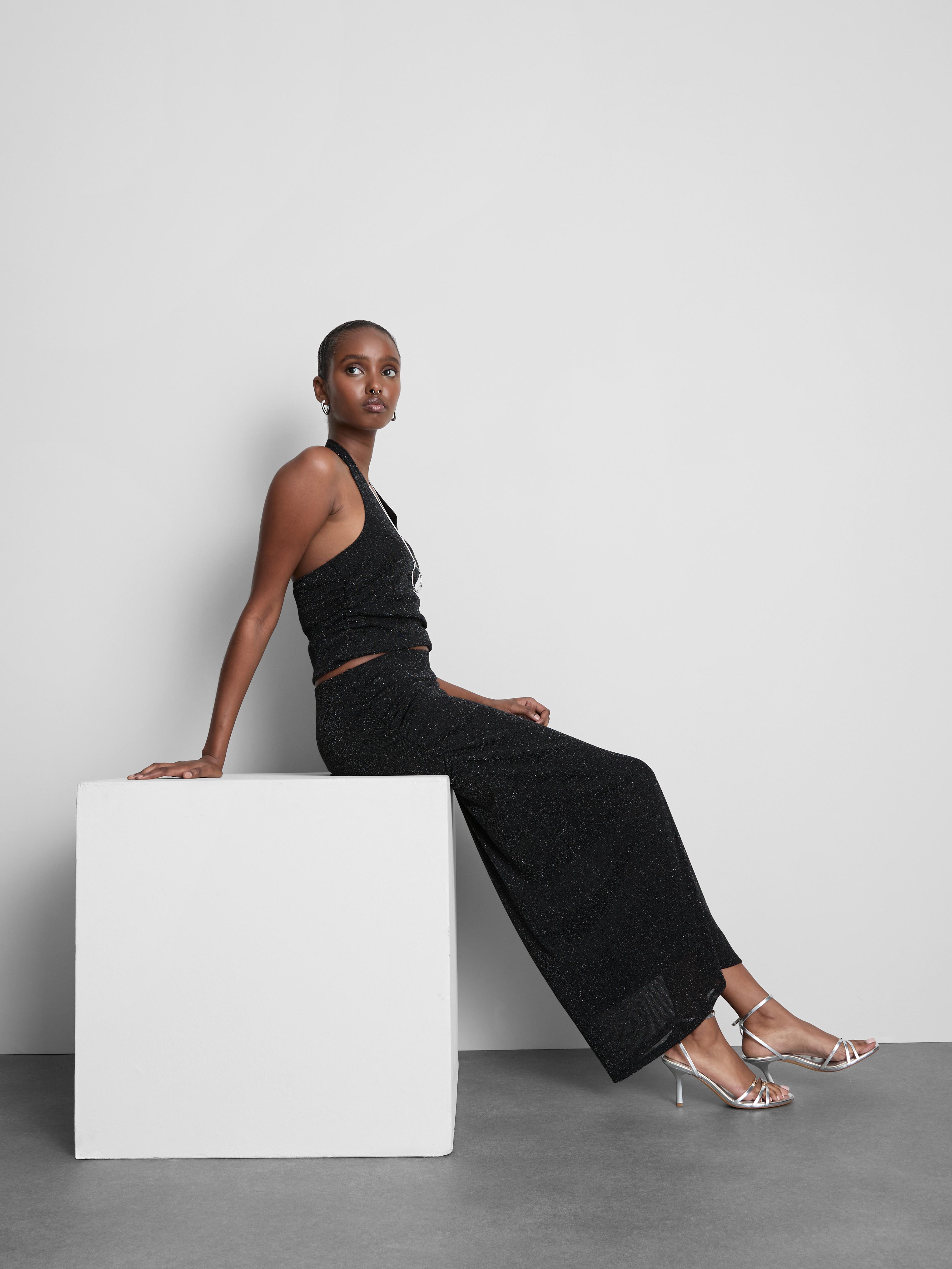 Dlhá trblietavá pletená sukňa