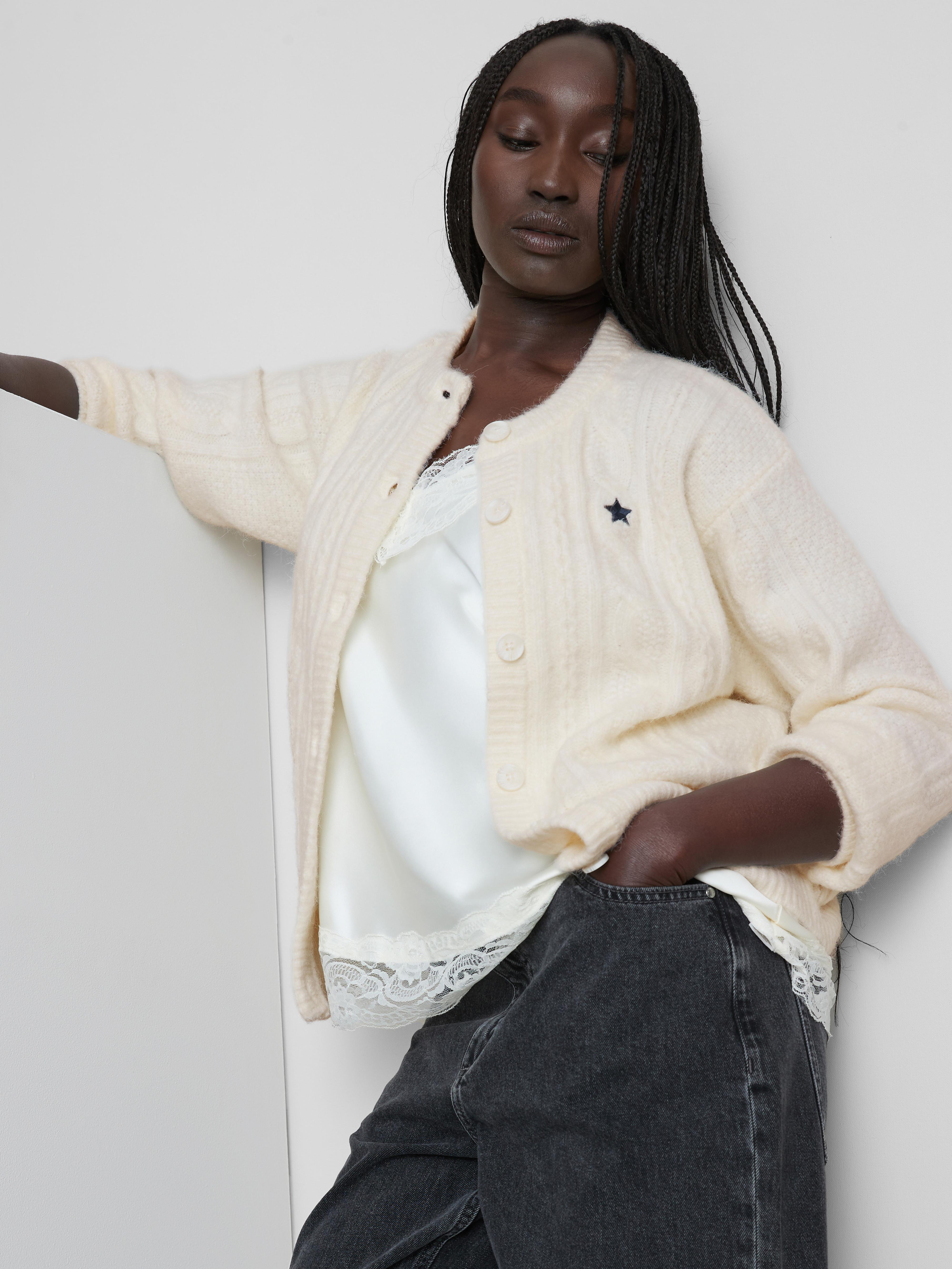 Cardigan in maglia a trecce con stella