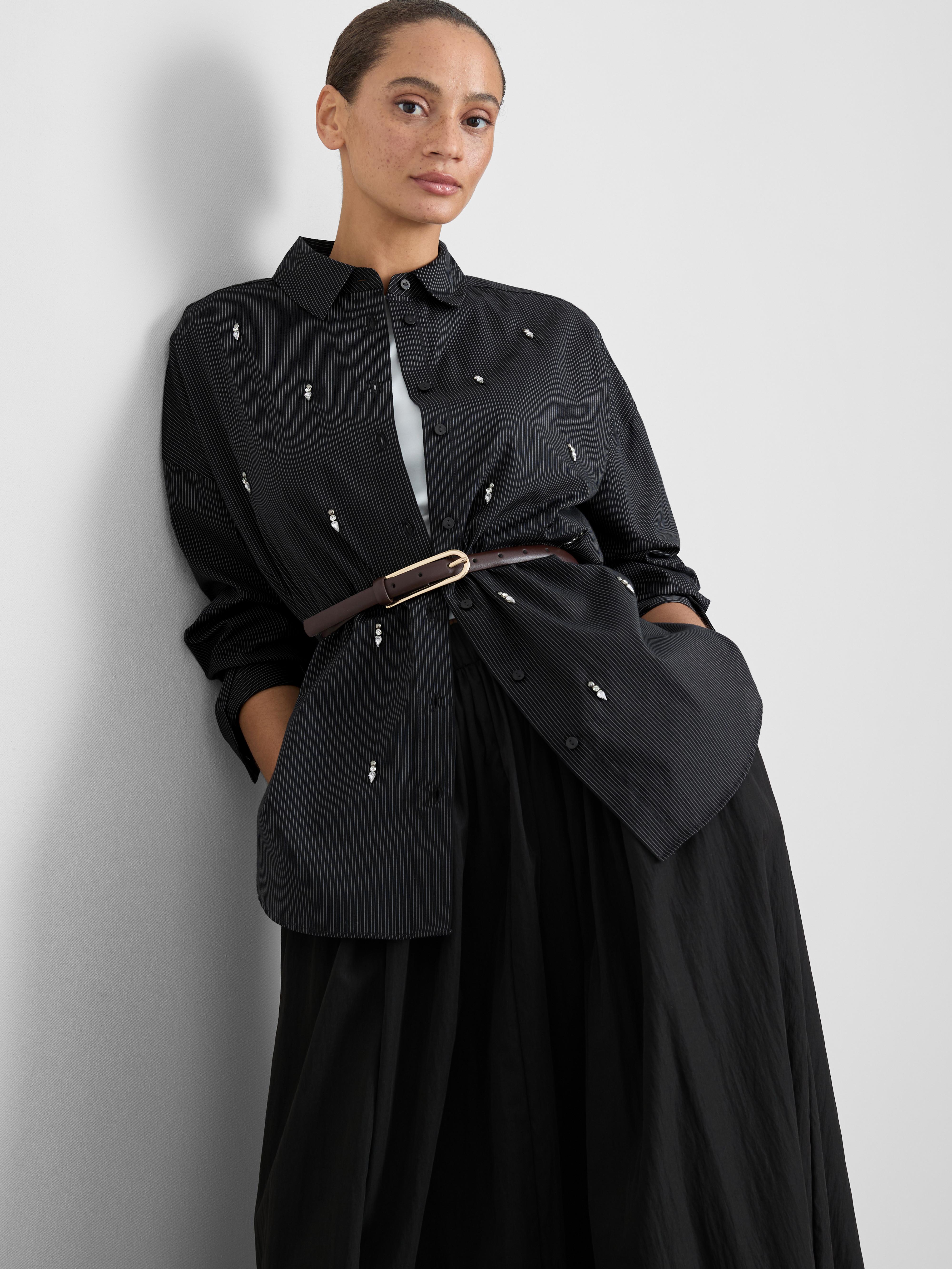 Camisa adornada con perlas sintéticas