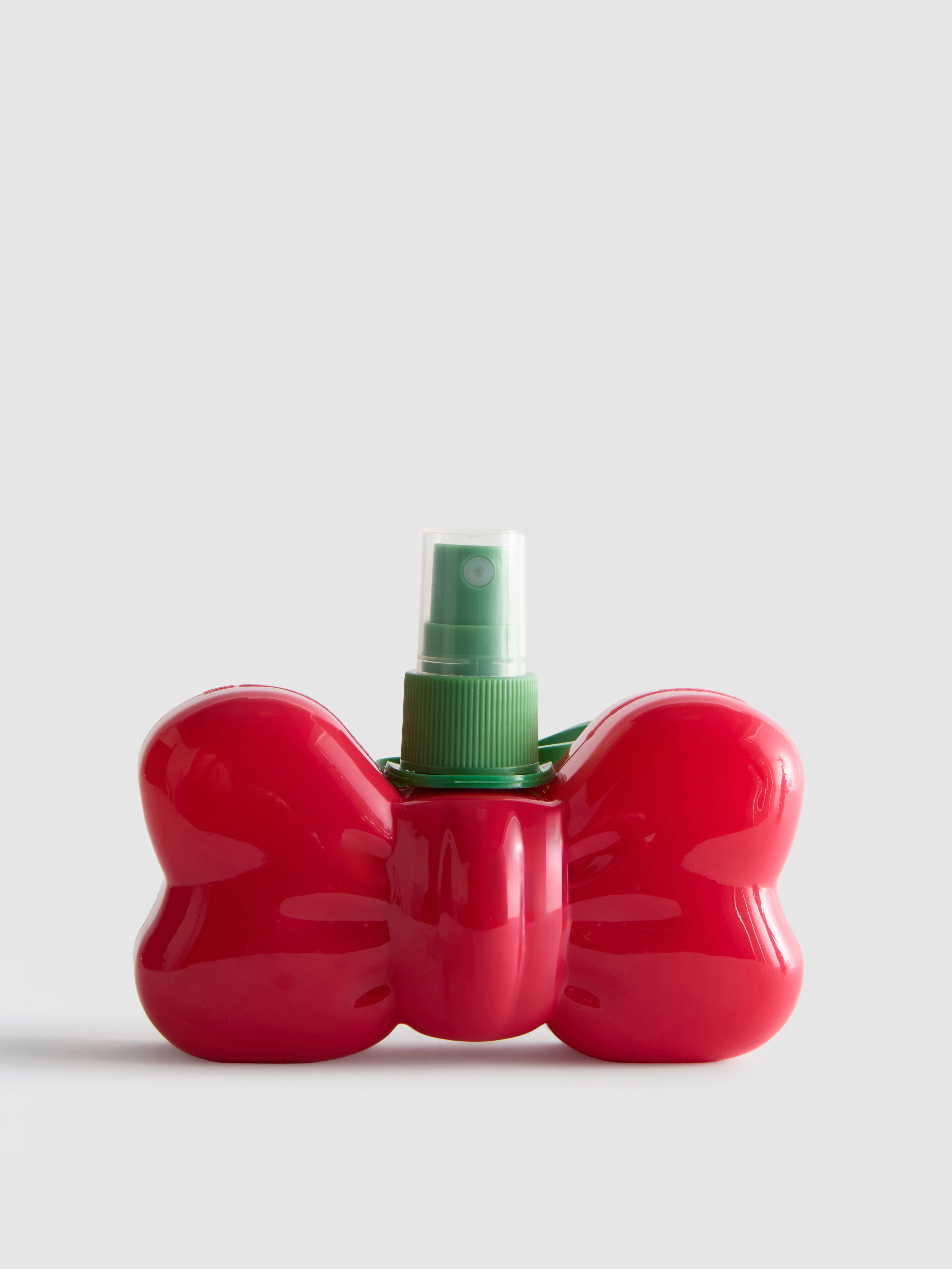 Spuitfles in strikvorm