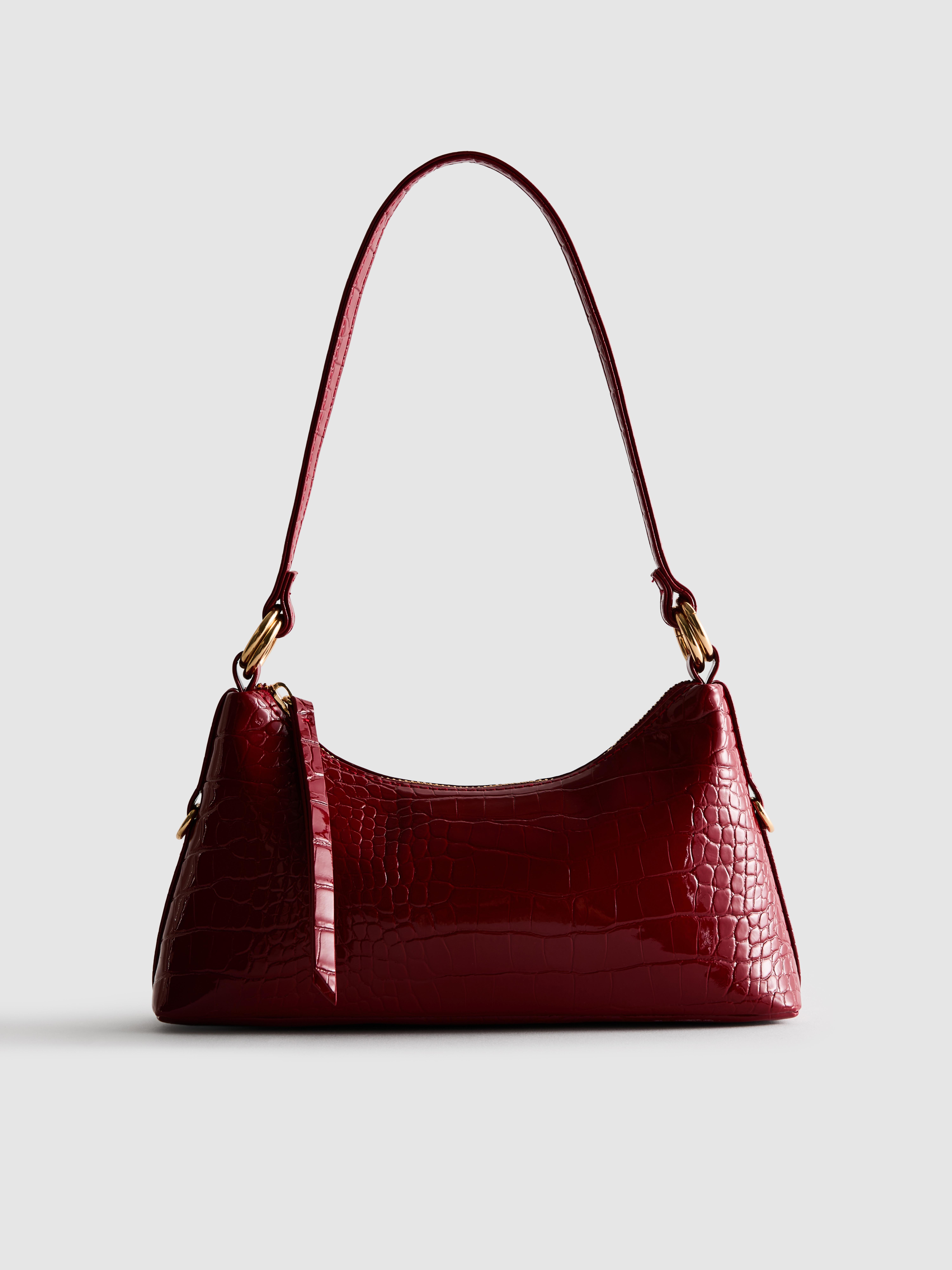 Mala de ombro em imitação de pele