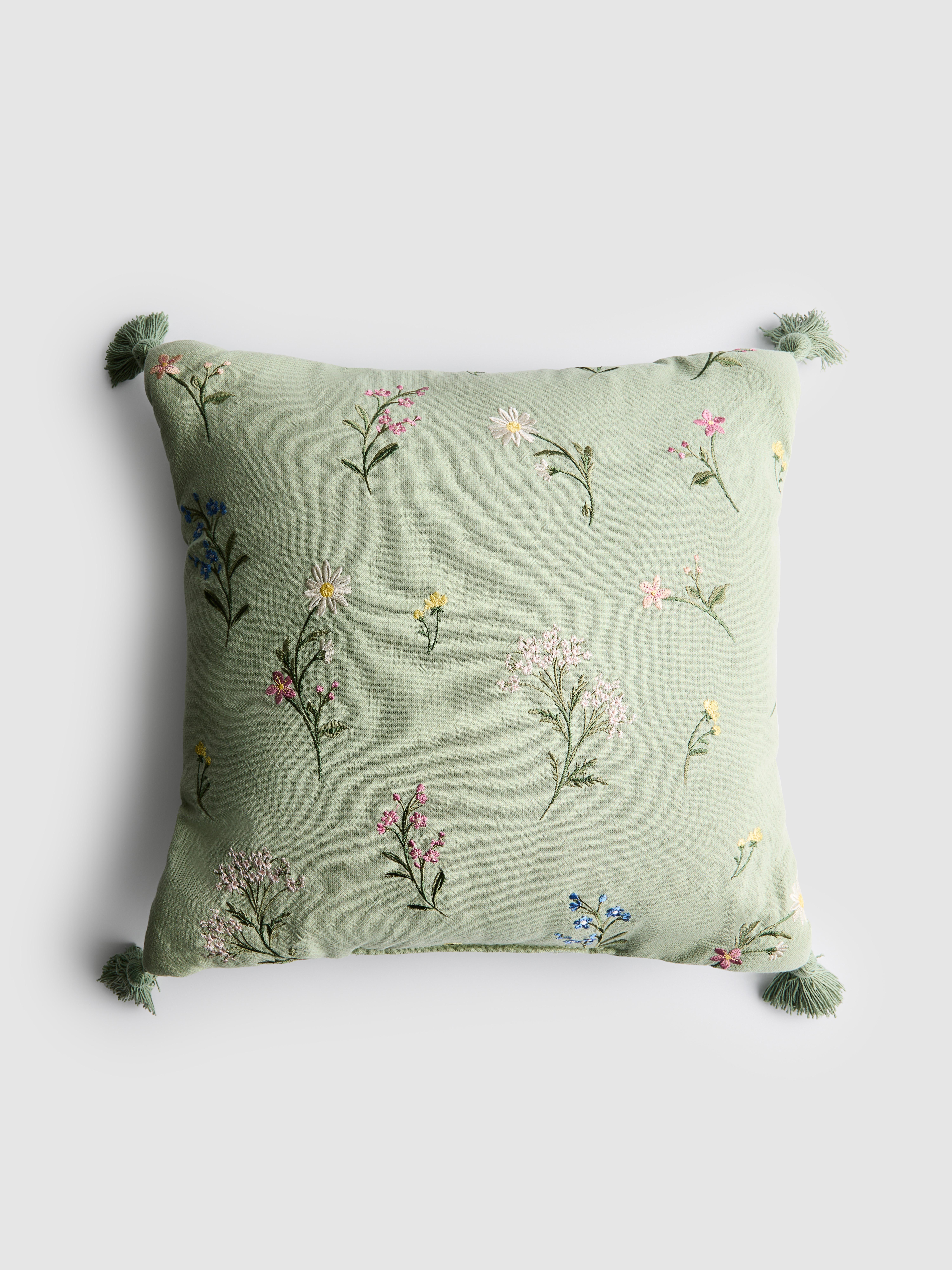 Coussin carré à fleurs brodées