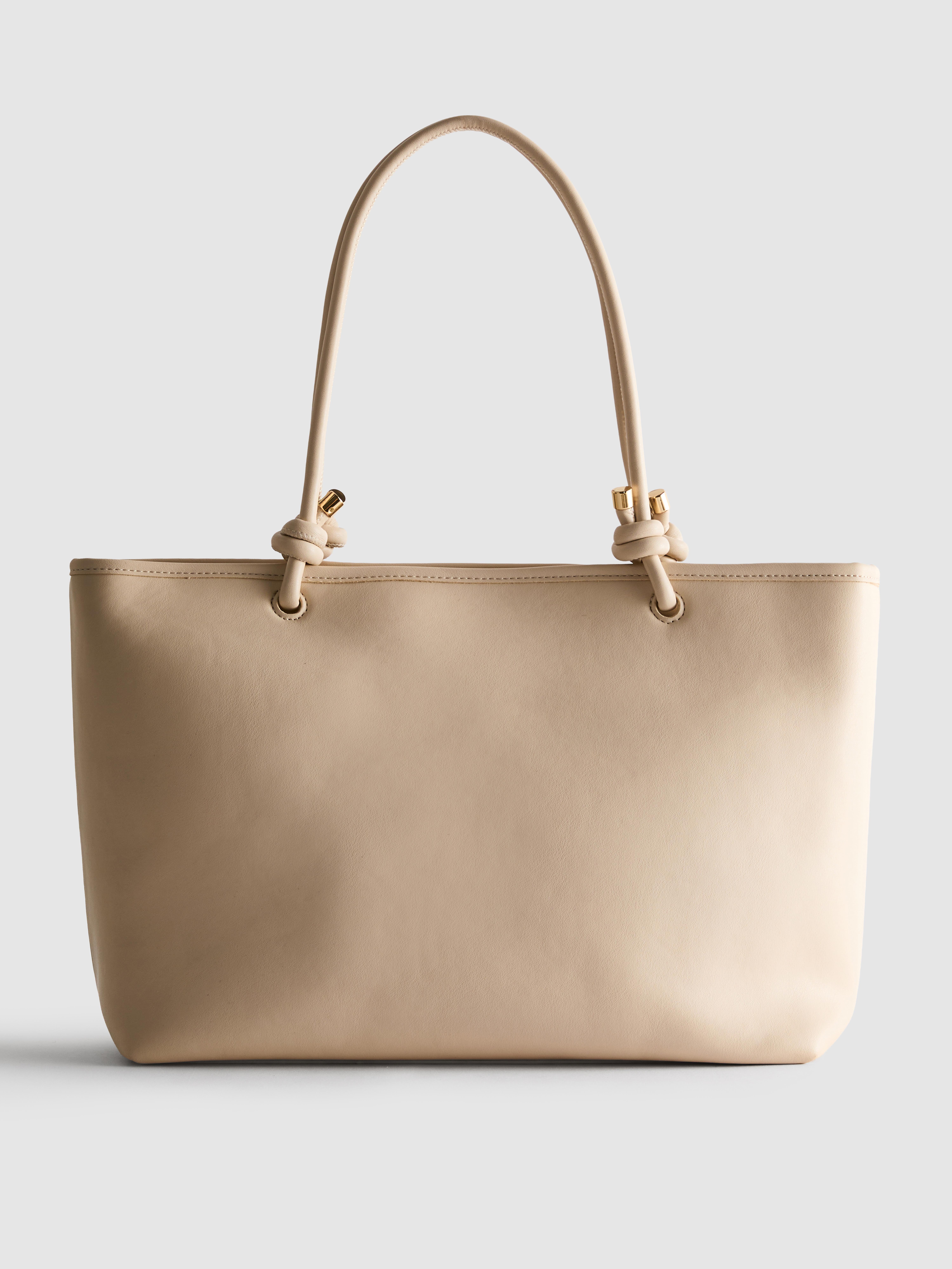 Torbica z ročajem z vozli