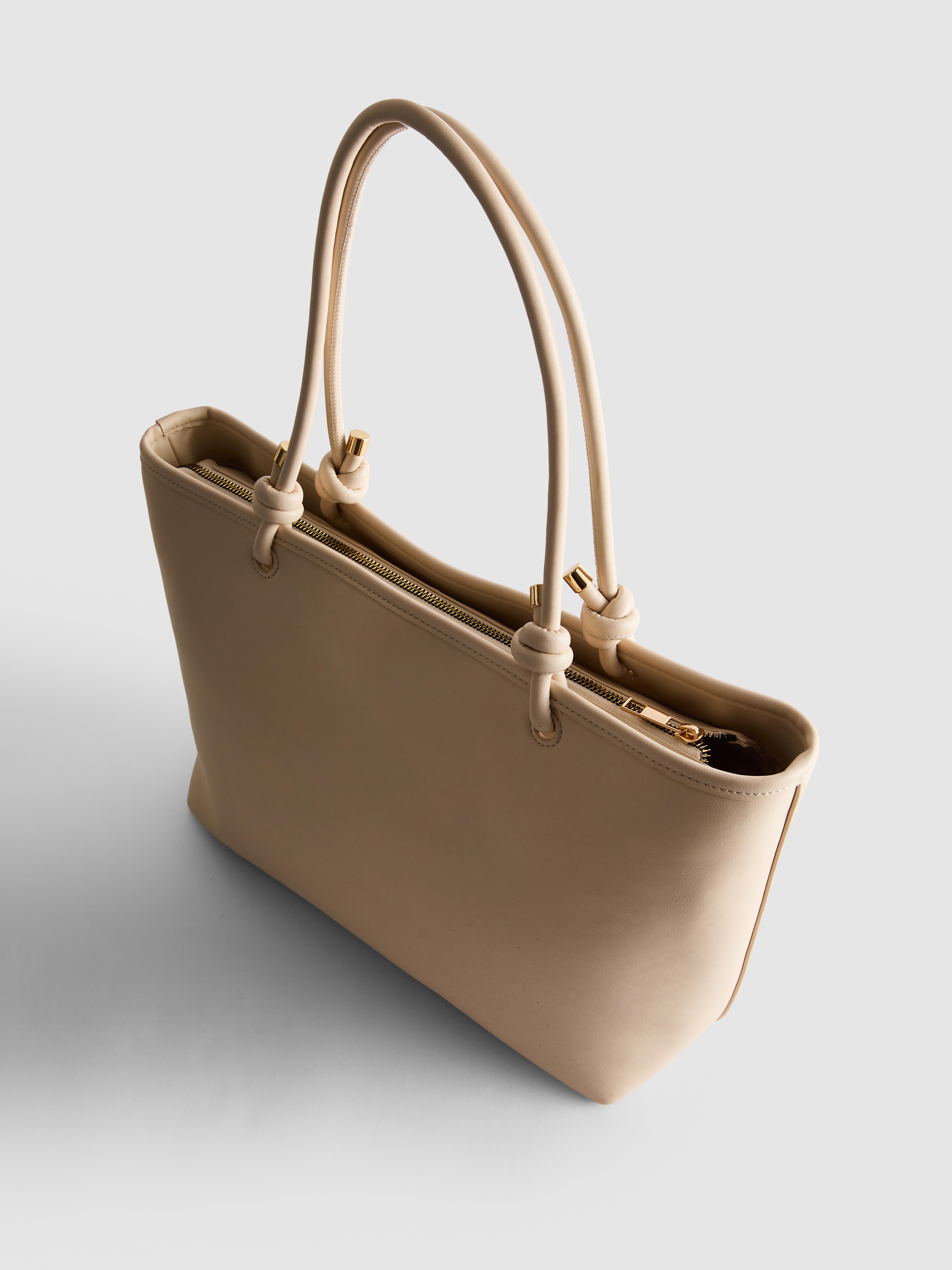 Torbica z ročajem z vozli