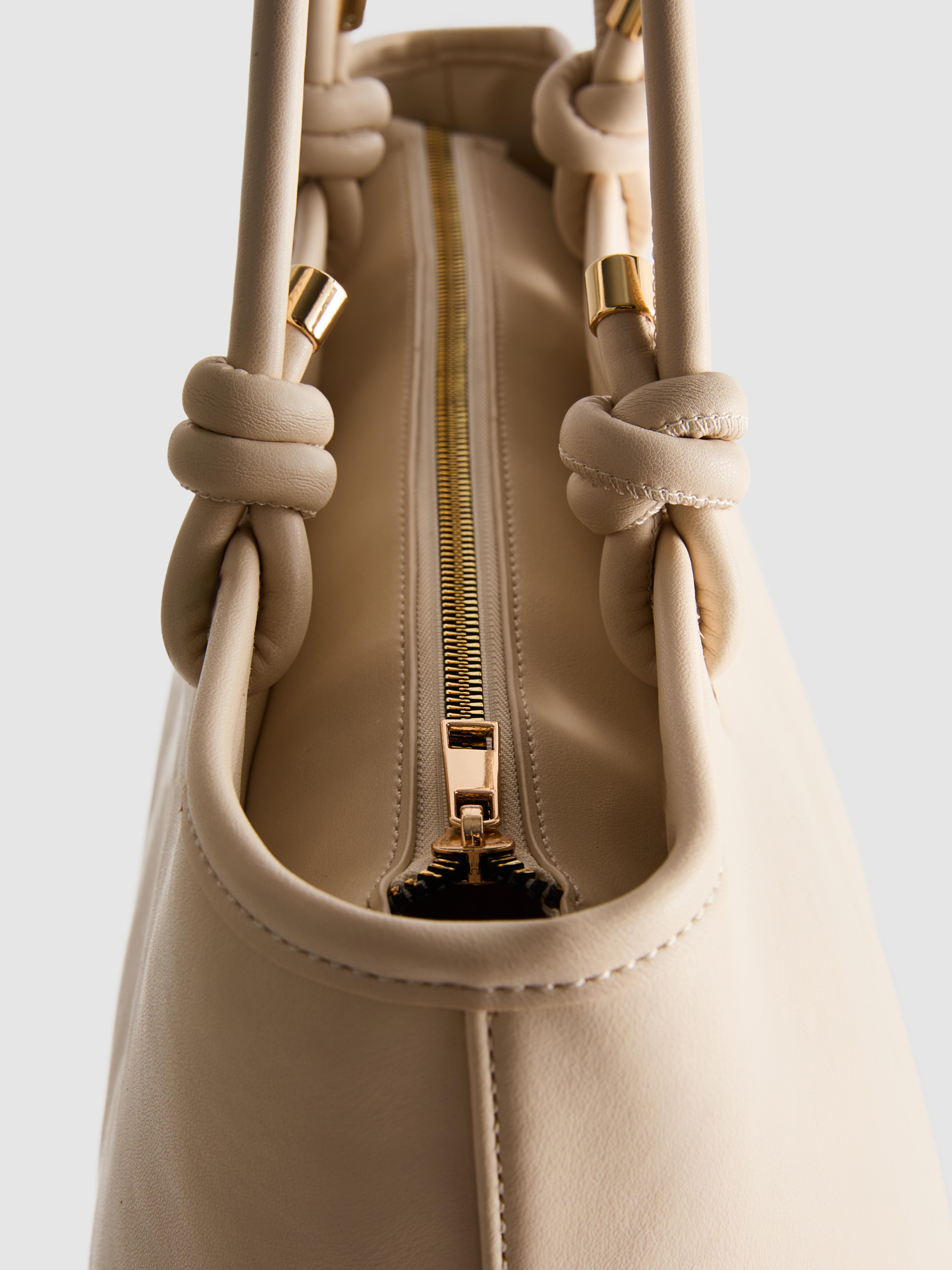 Torbica z ročajem z vozli