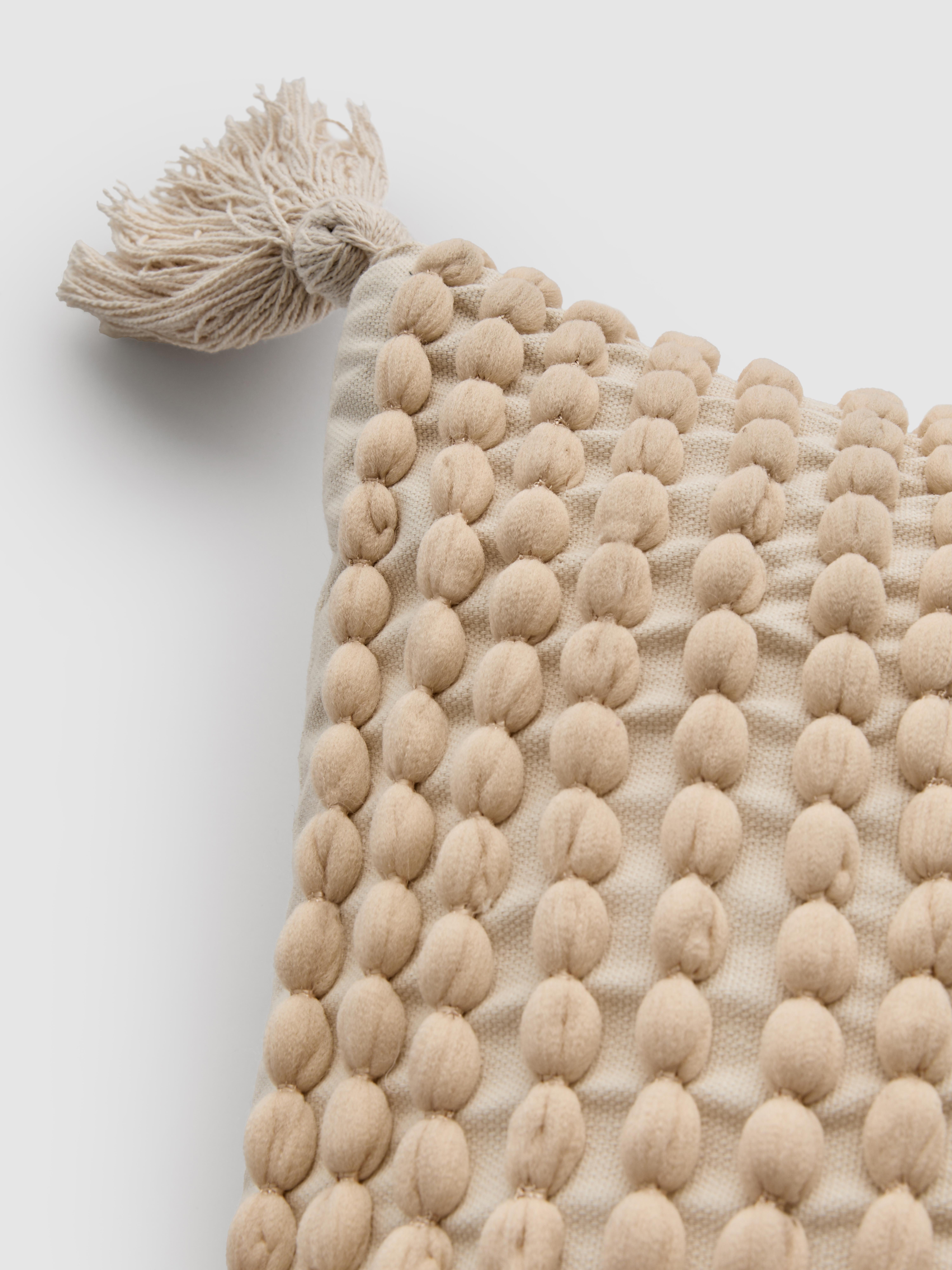 Vierkant sierkussen met bobbels