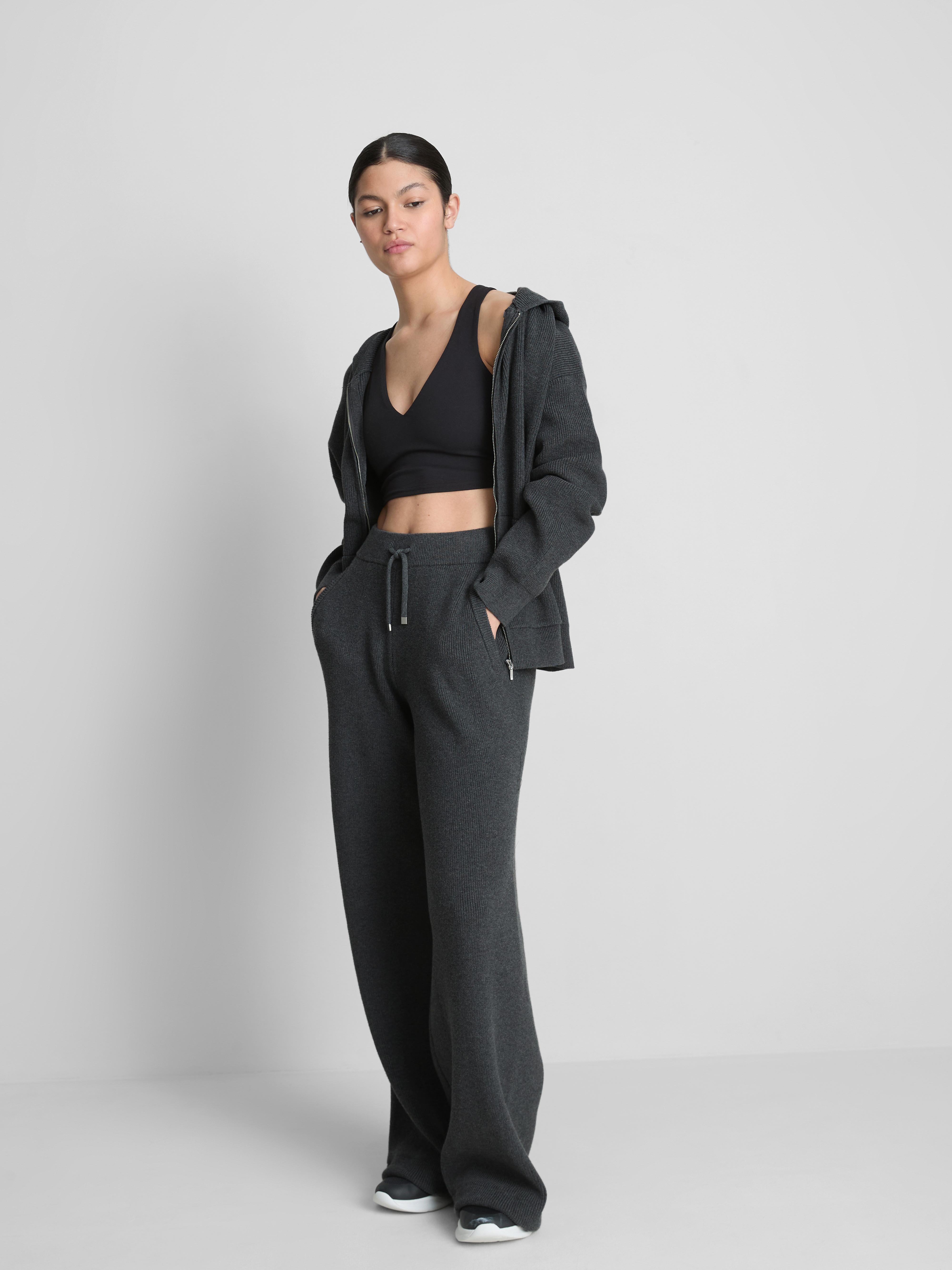 Kötött kapucnis kardigán bordázott anyagból, végig cipzárral