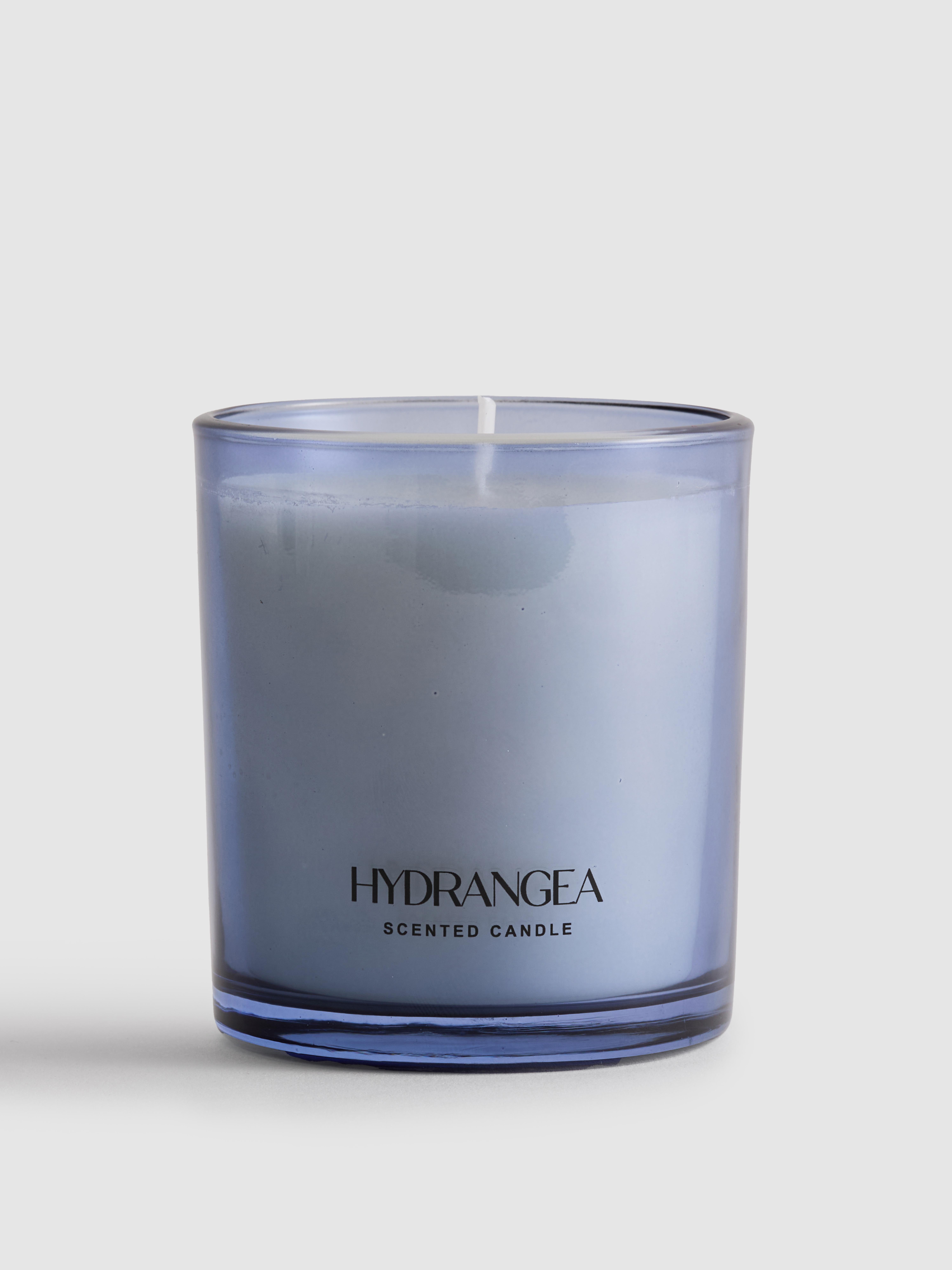 Bougie en pot au parfum floral