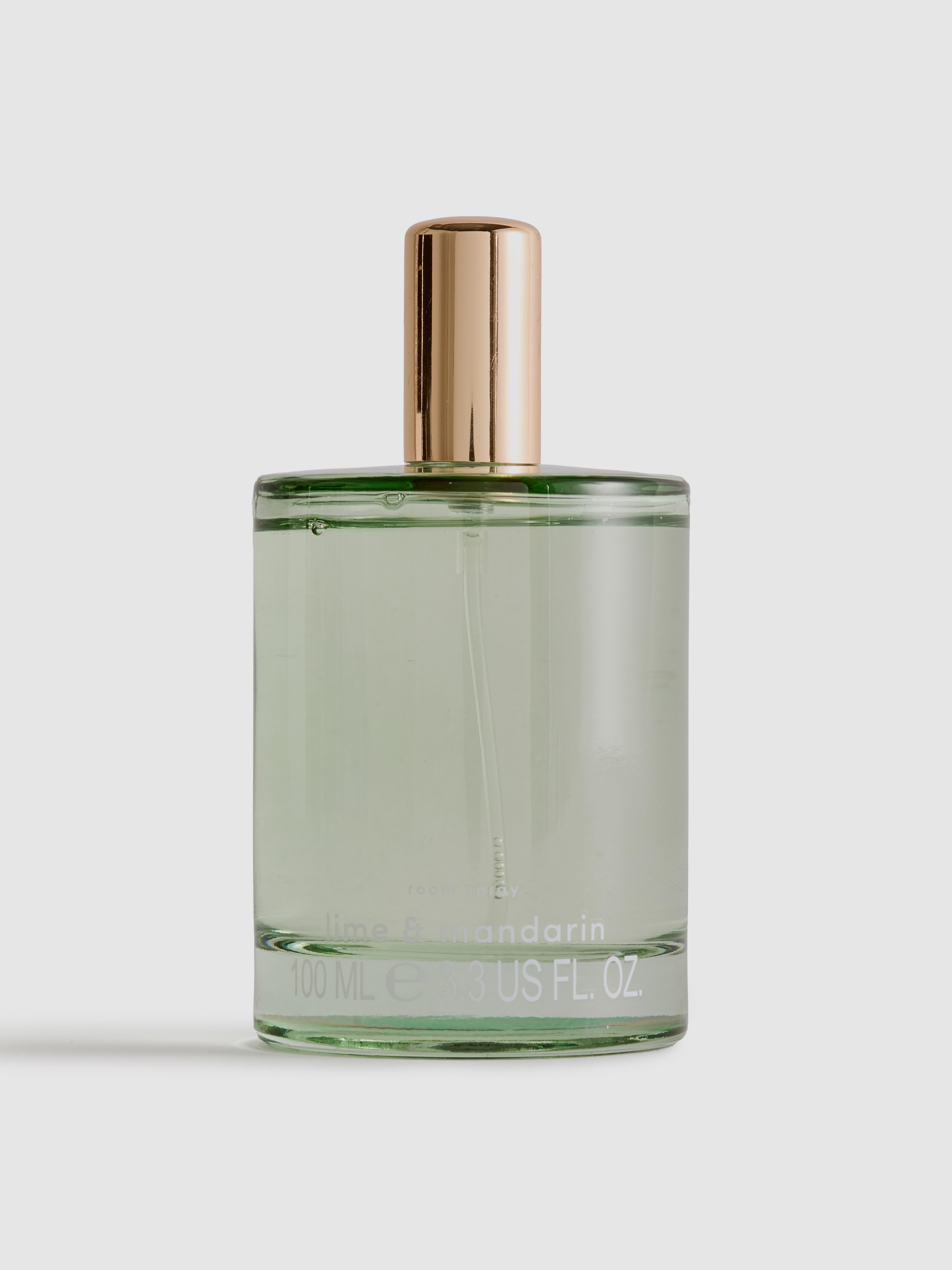 Duftendes Raumspray in farbigem Glas