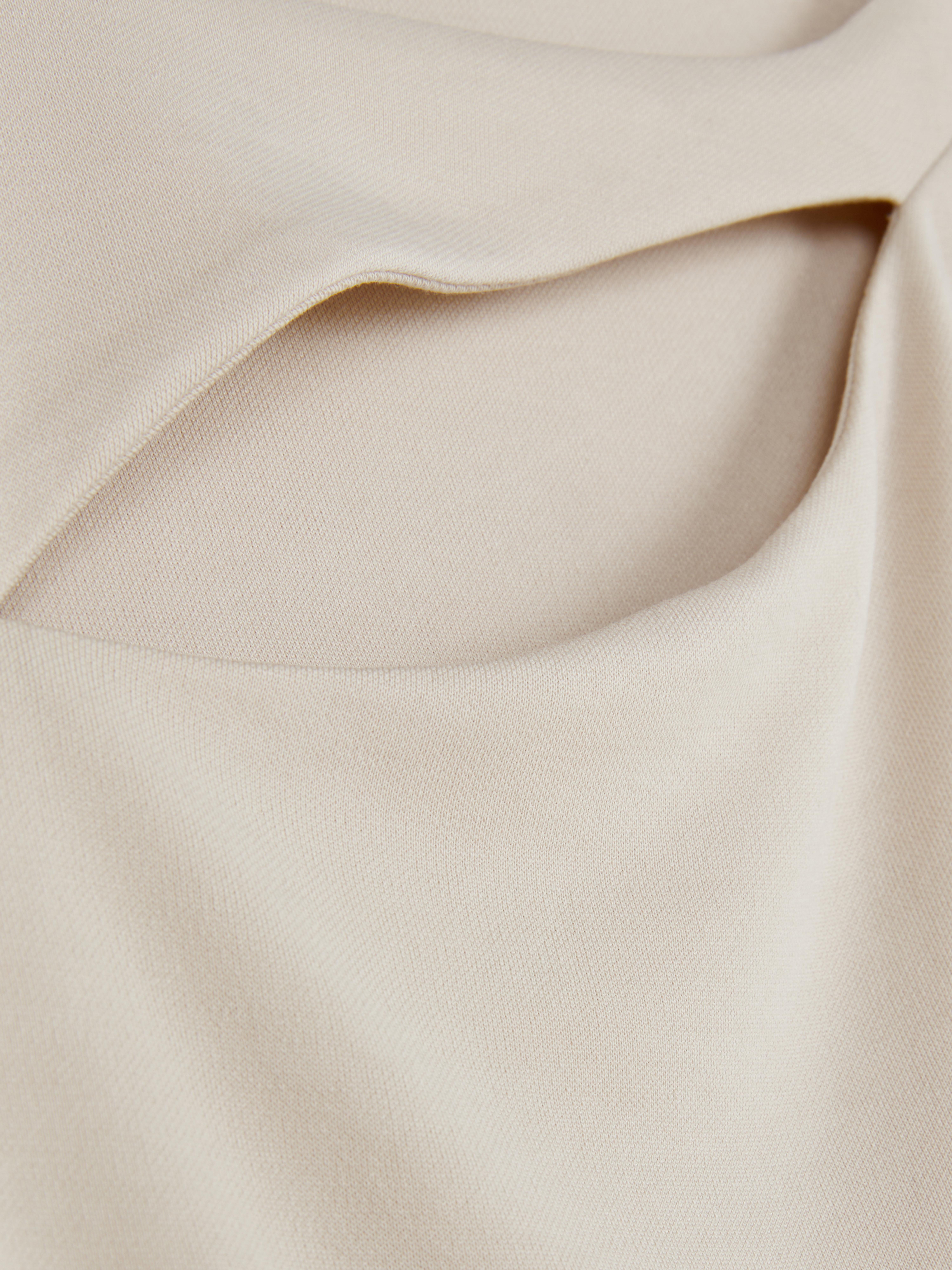 9-15 ans | Haut asymétrique ajouré à manches longues