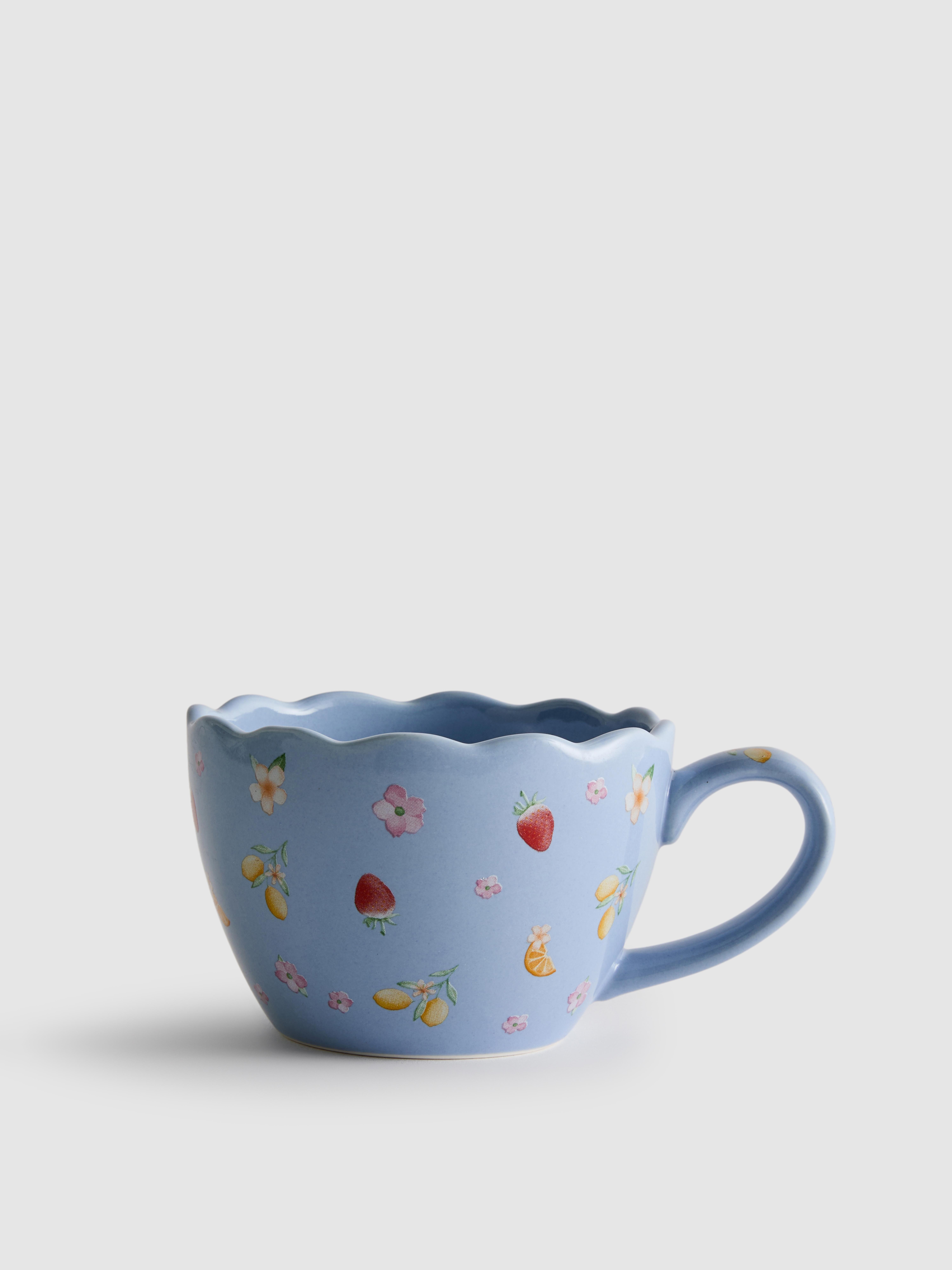 Cană cu model și margine ondulată