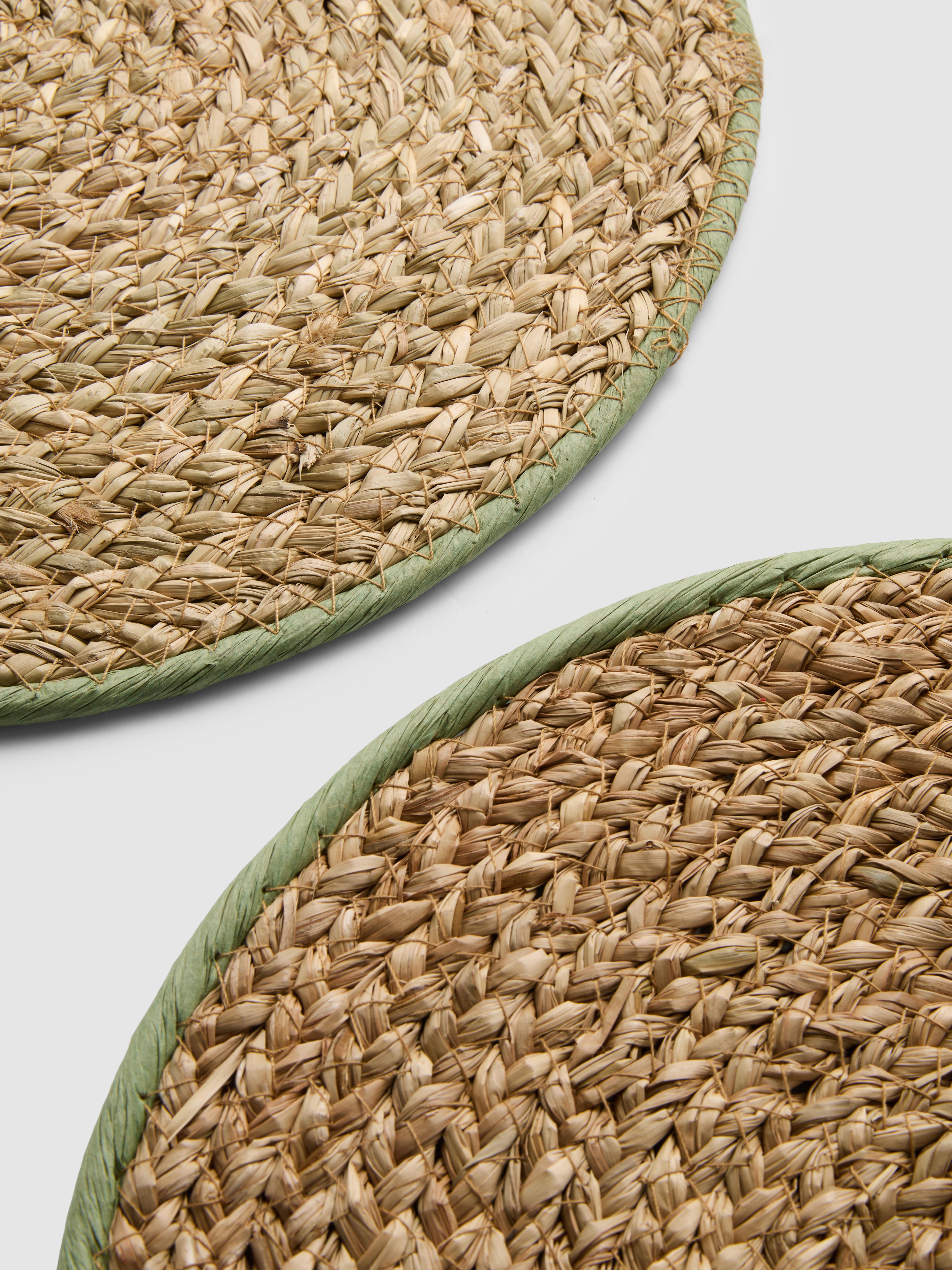 Lot de 2 sets de table ronds en rotin