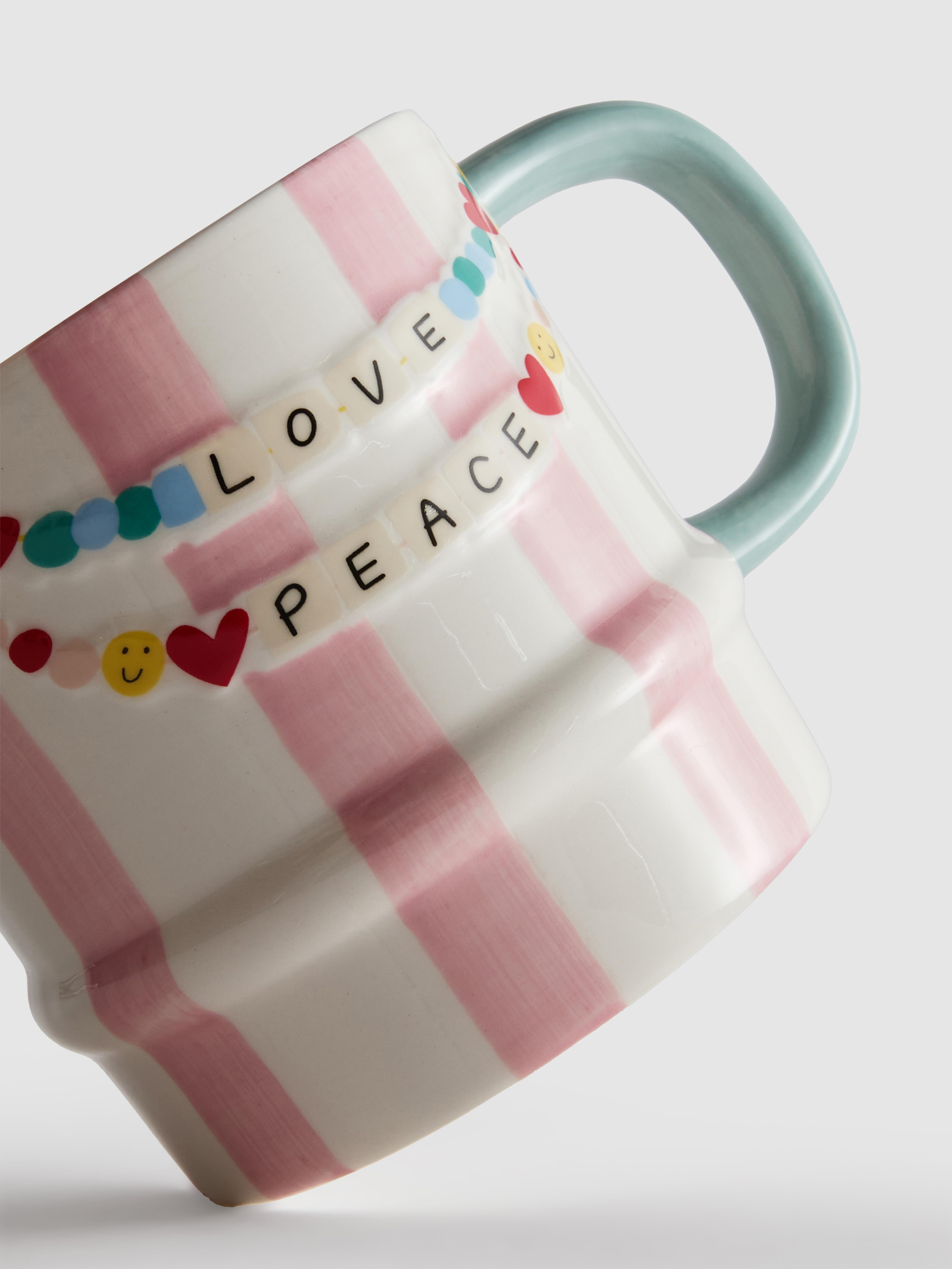 Gestreifte Keramiktasse