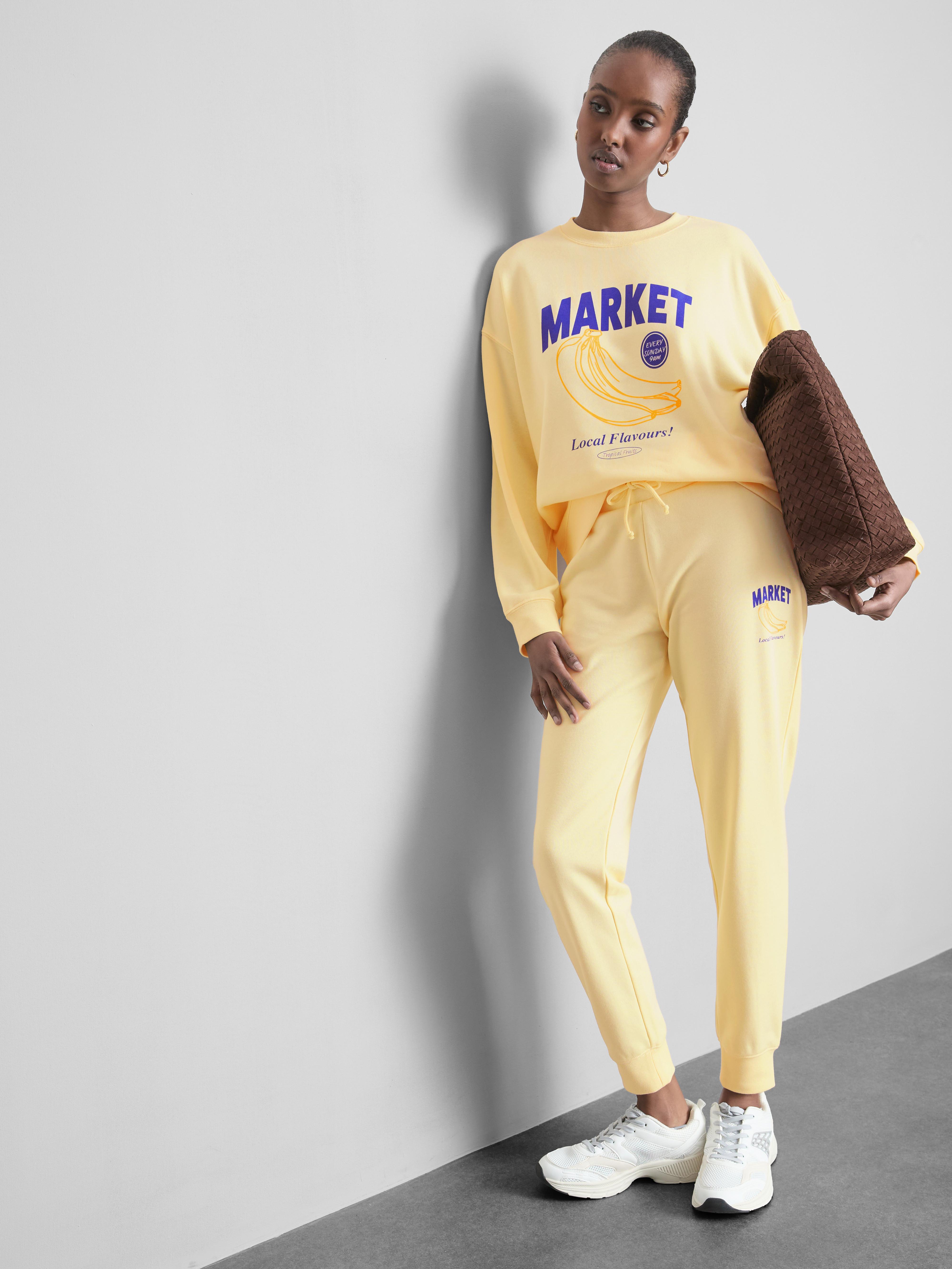 Oprijete potiskane športne hlače iz mešanice bombaža Limonina