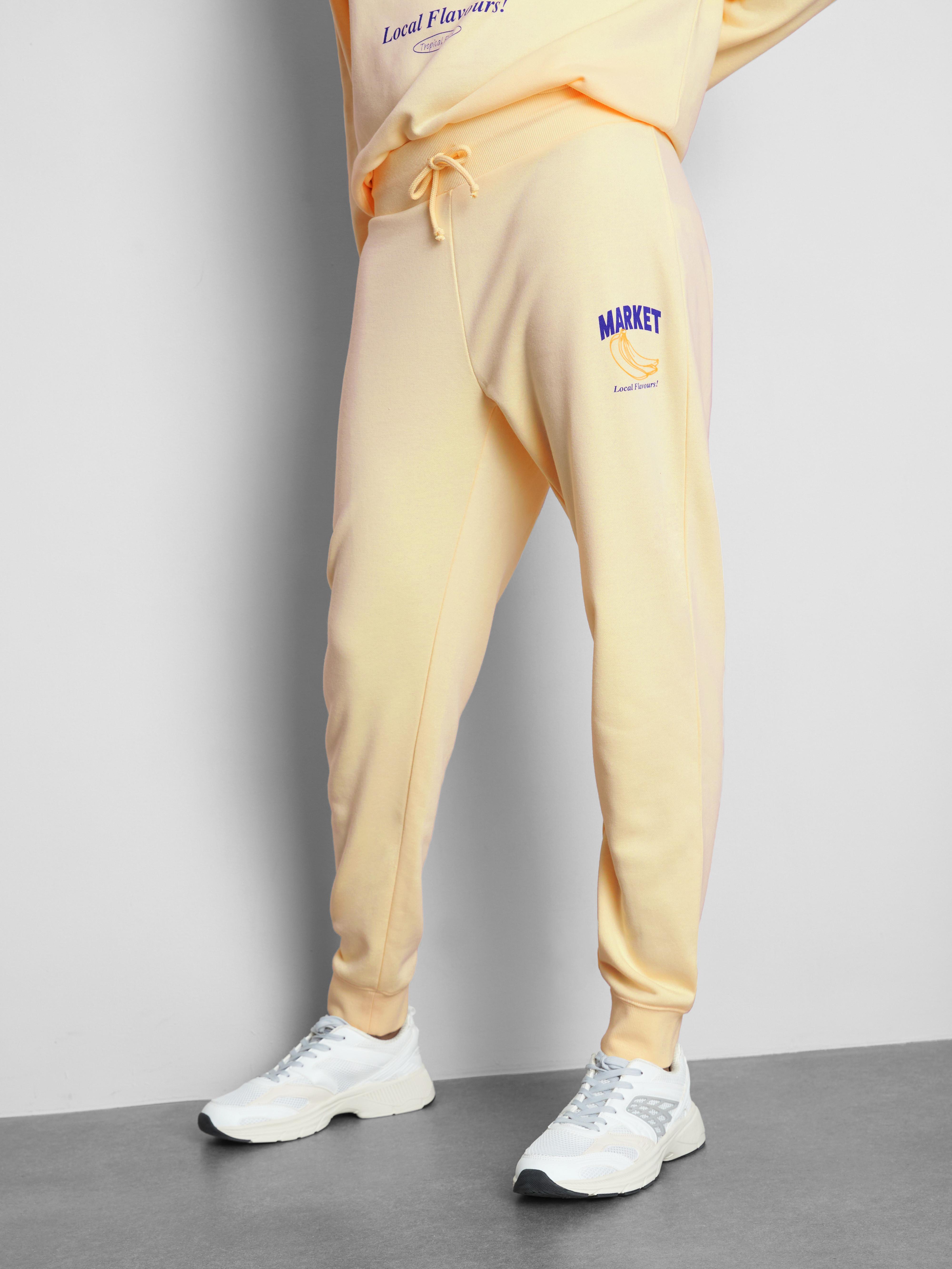 Skinny tepláky ze směsi bavlny s potiskem
