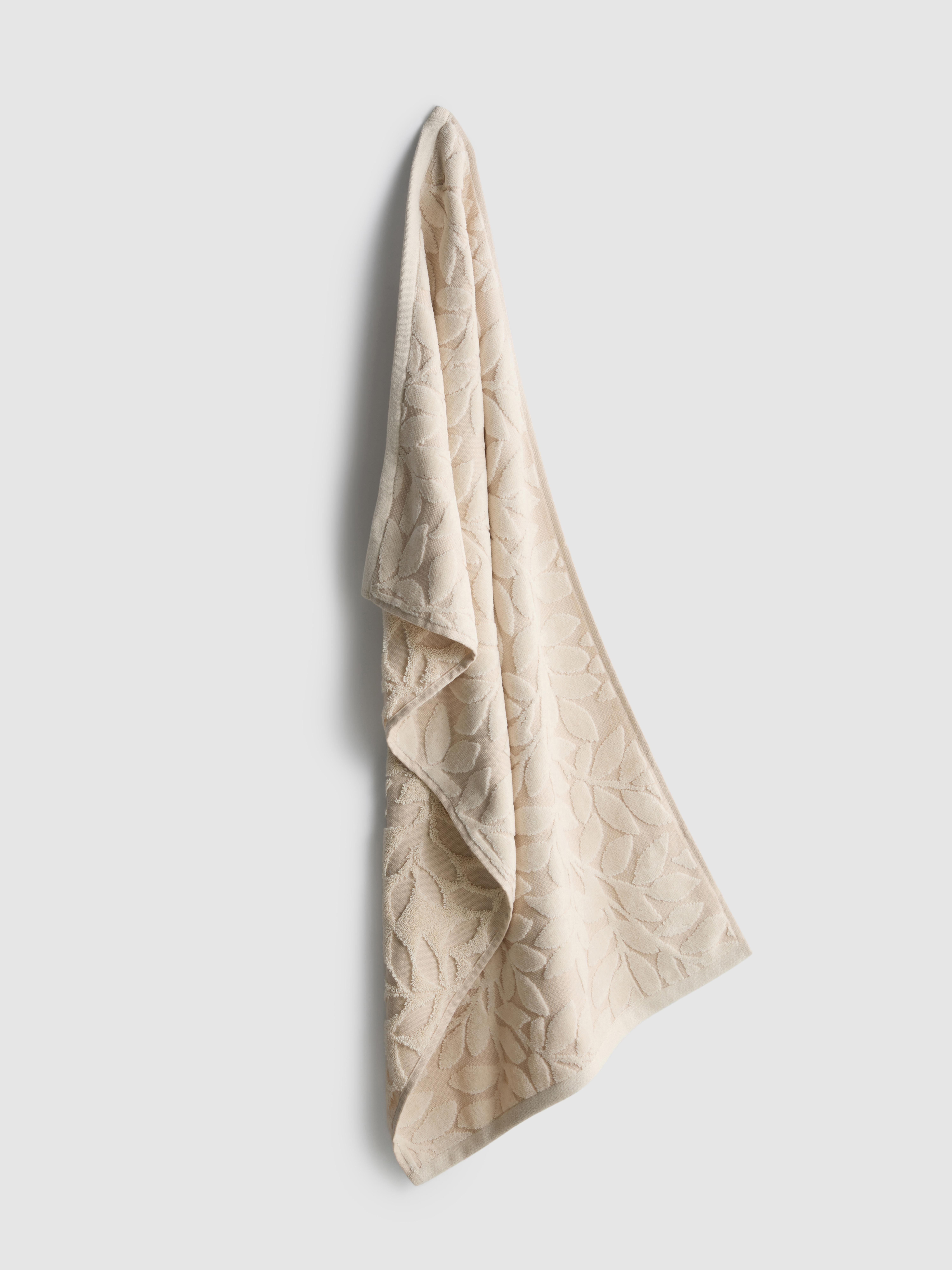 Toalla de mano con diseño de hojas