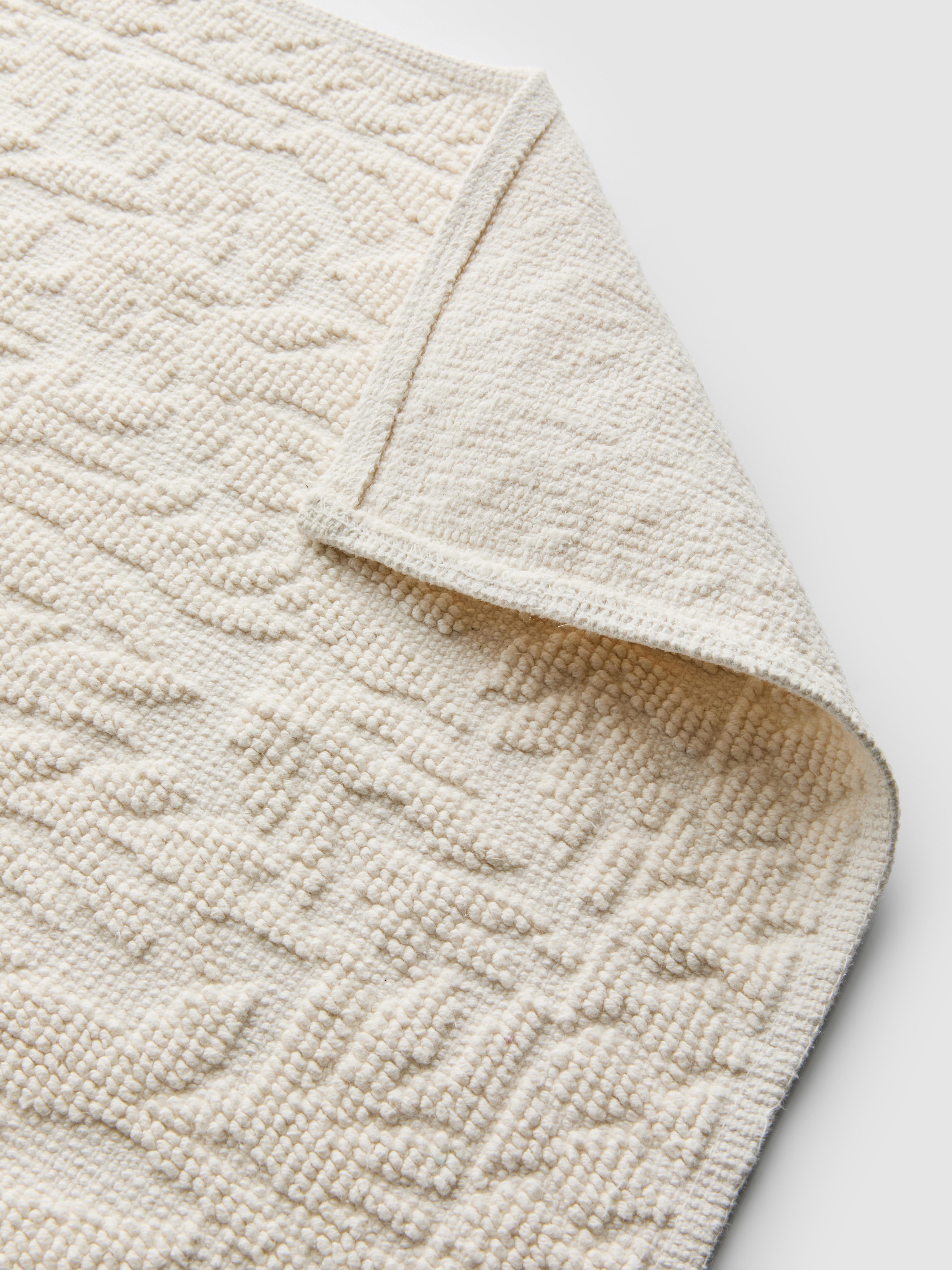 Tapis de douche à motif feuilles