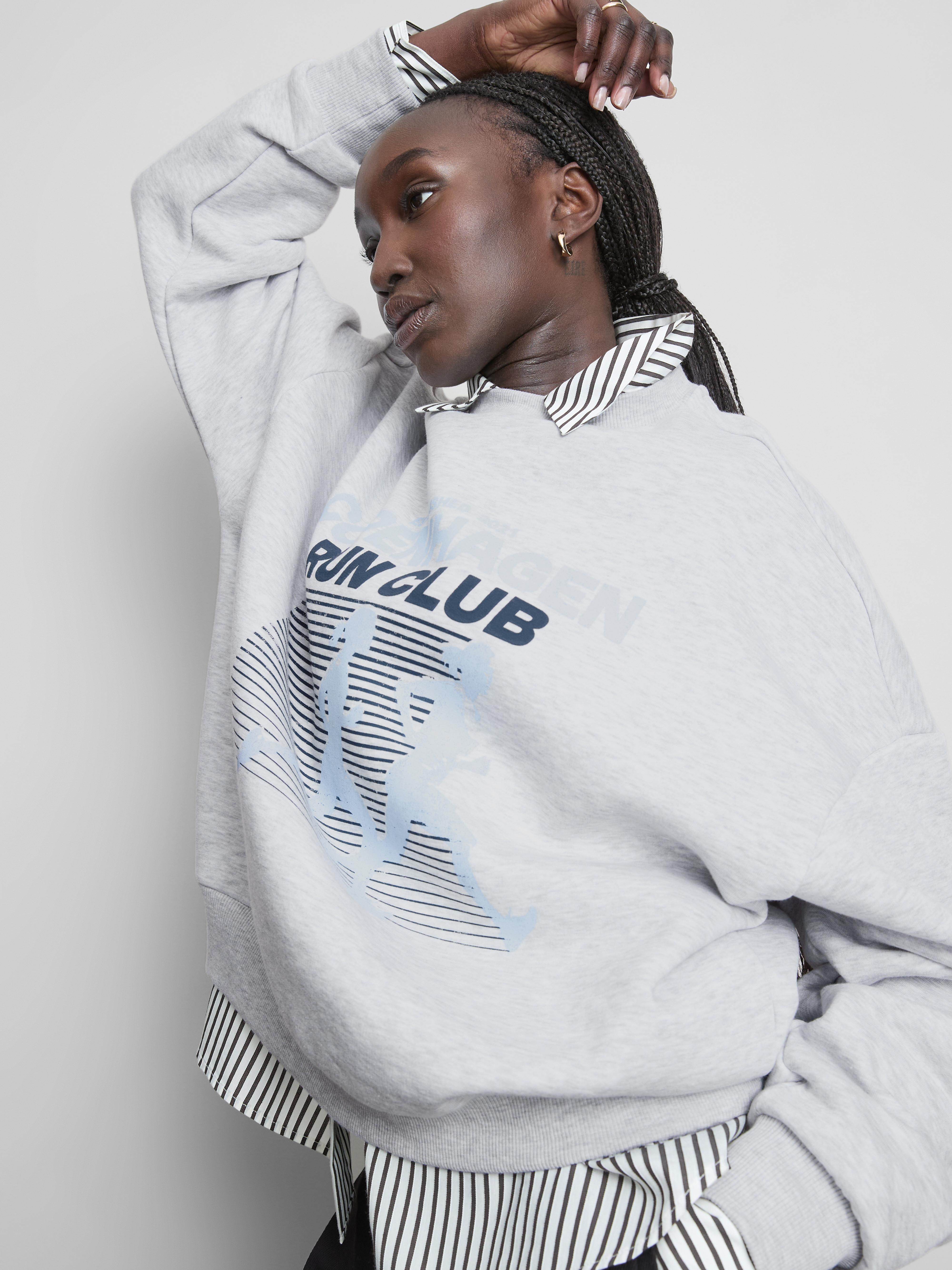 Mikina s motívom bežeckého klubu