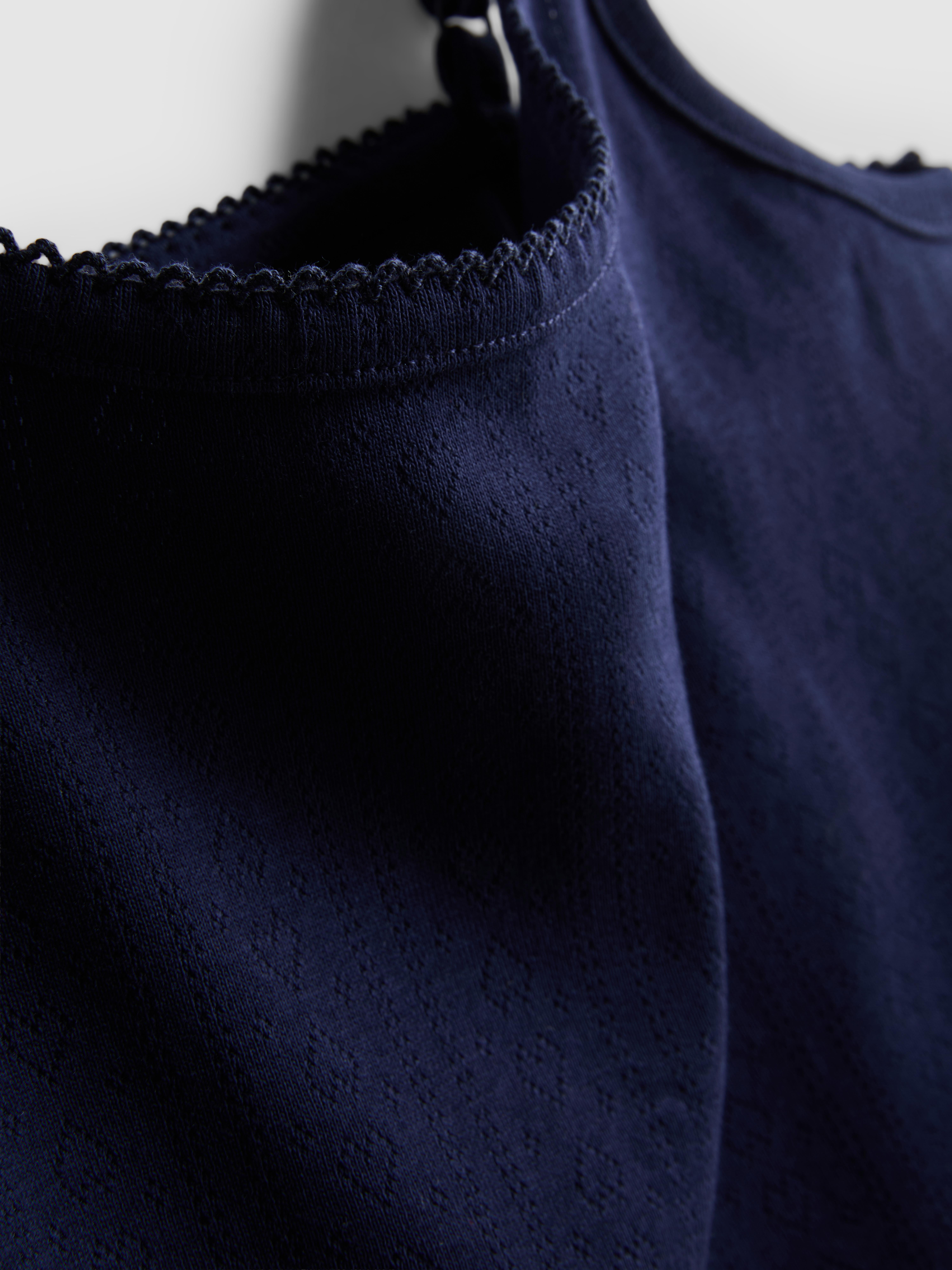 Bogaty w bawełnę, ażurowy top na ramiączkach