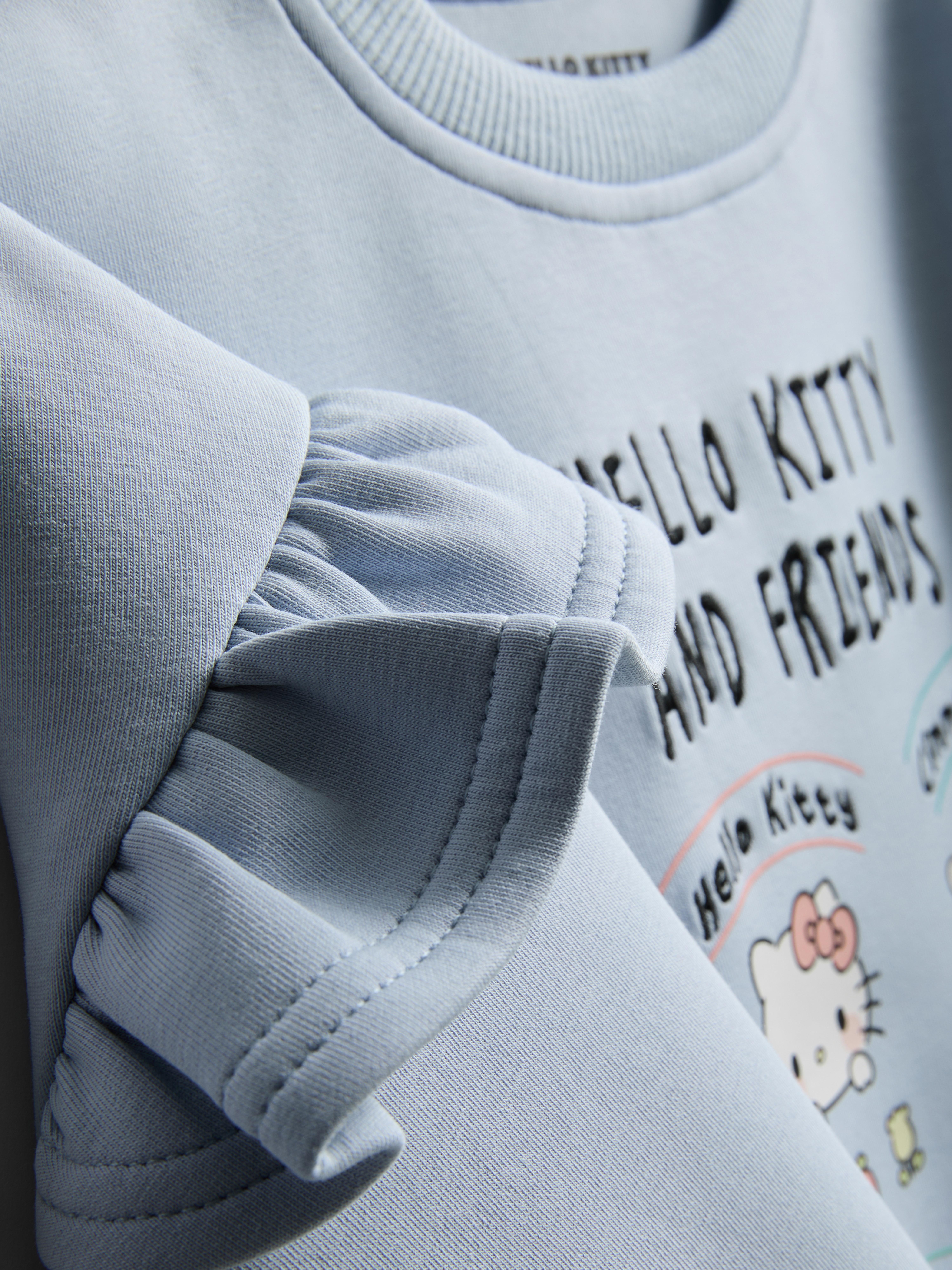 1.5-8yrs | Hello Kitty and Friends Ruffle Sweatshirt