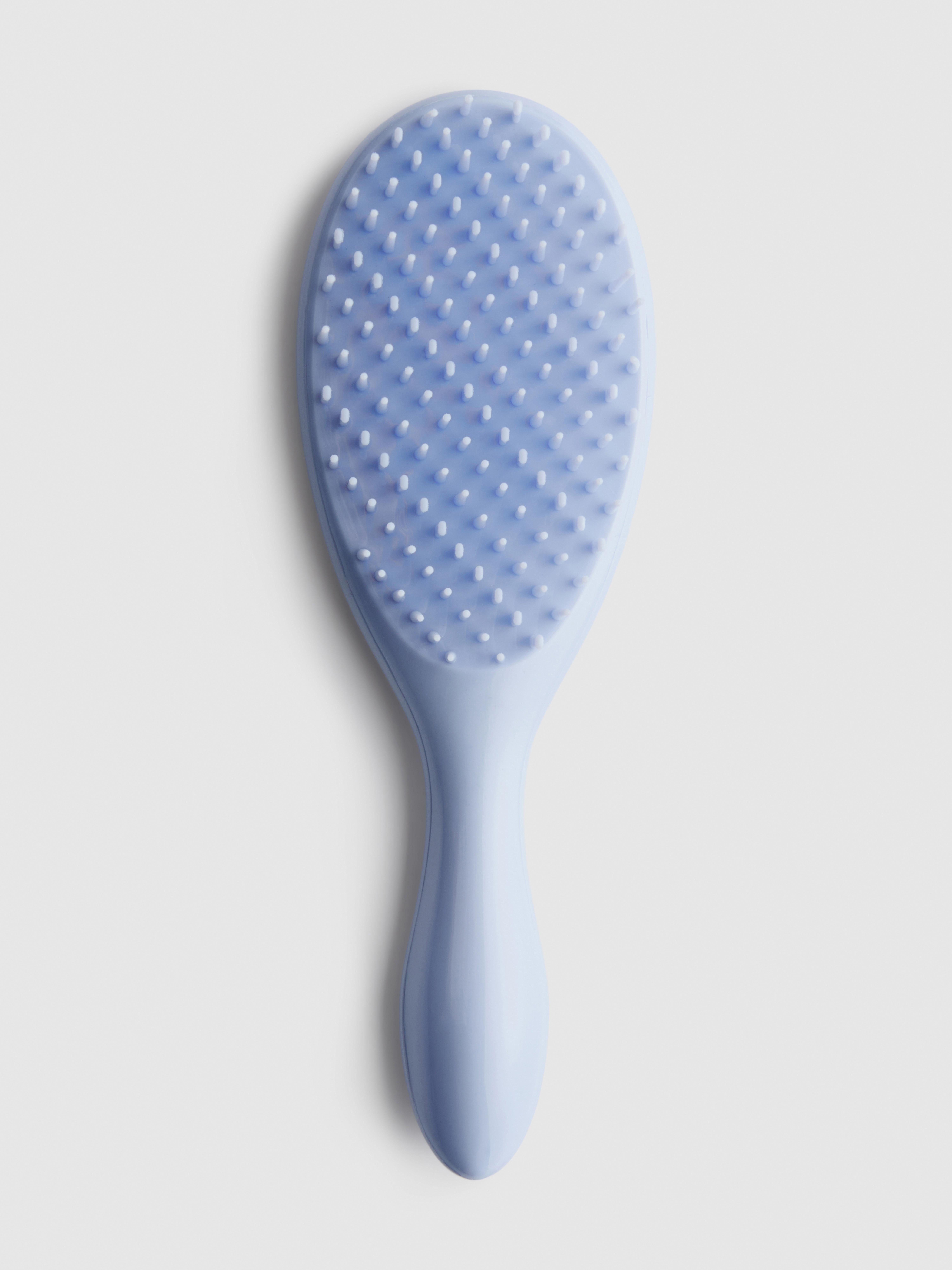 Spazzola districante per capelli