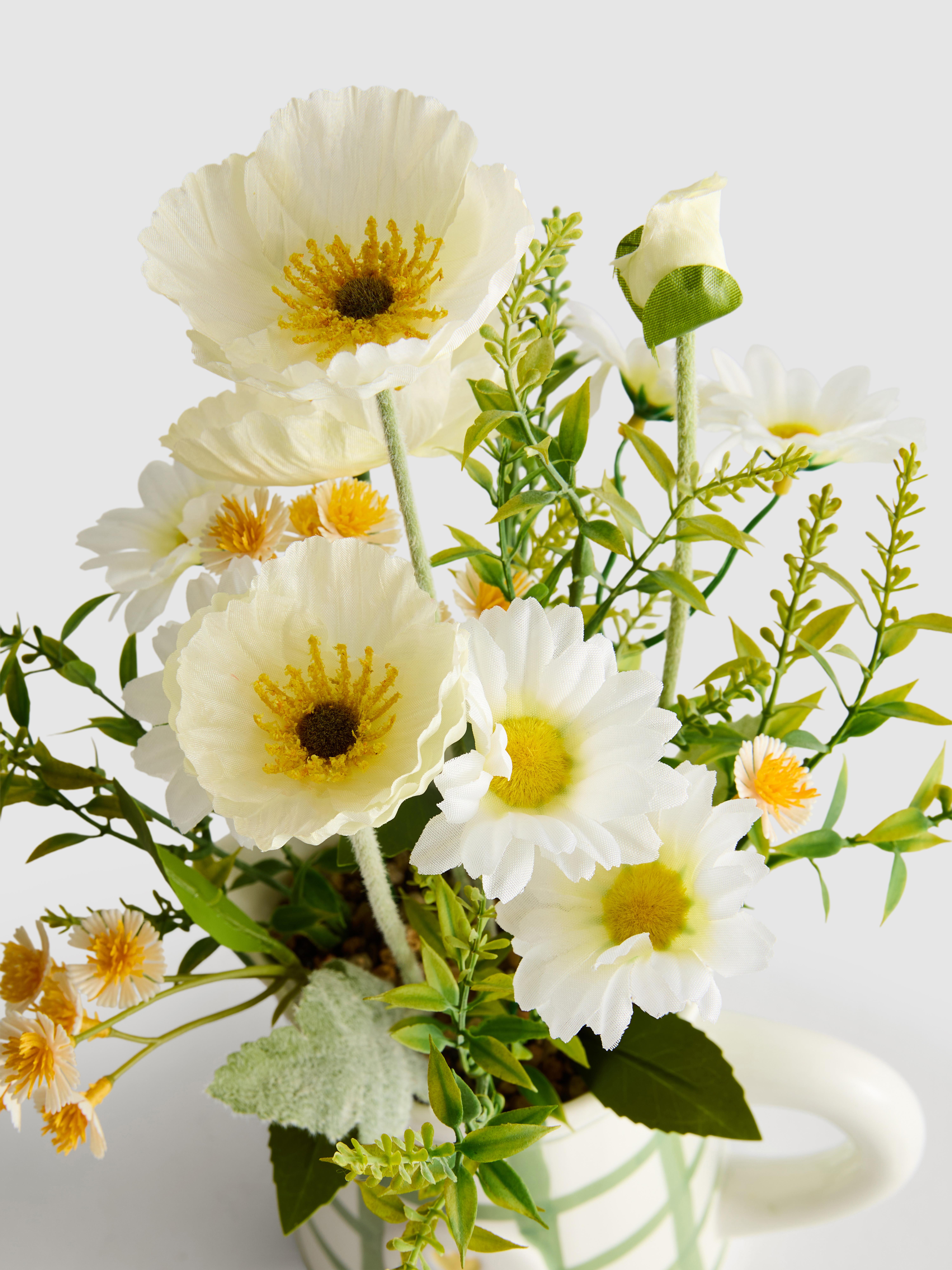 Faux Flower Arrangement In Ceramic Jug