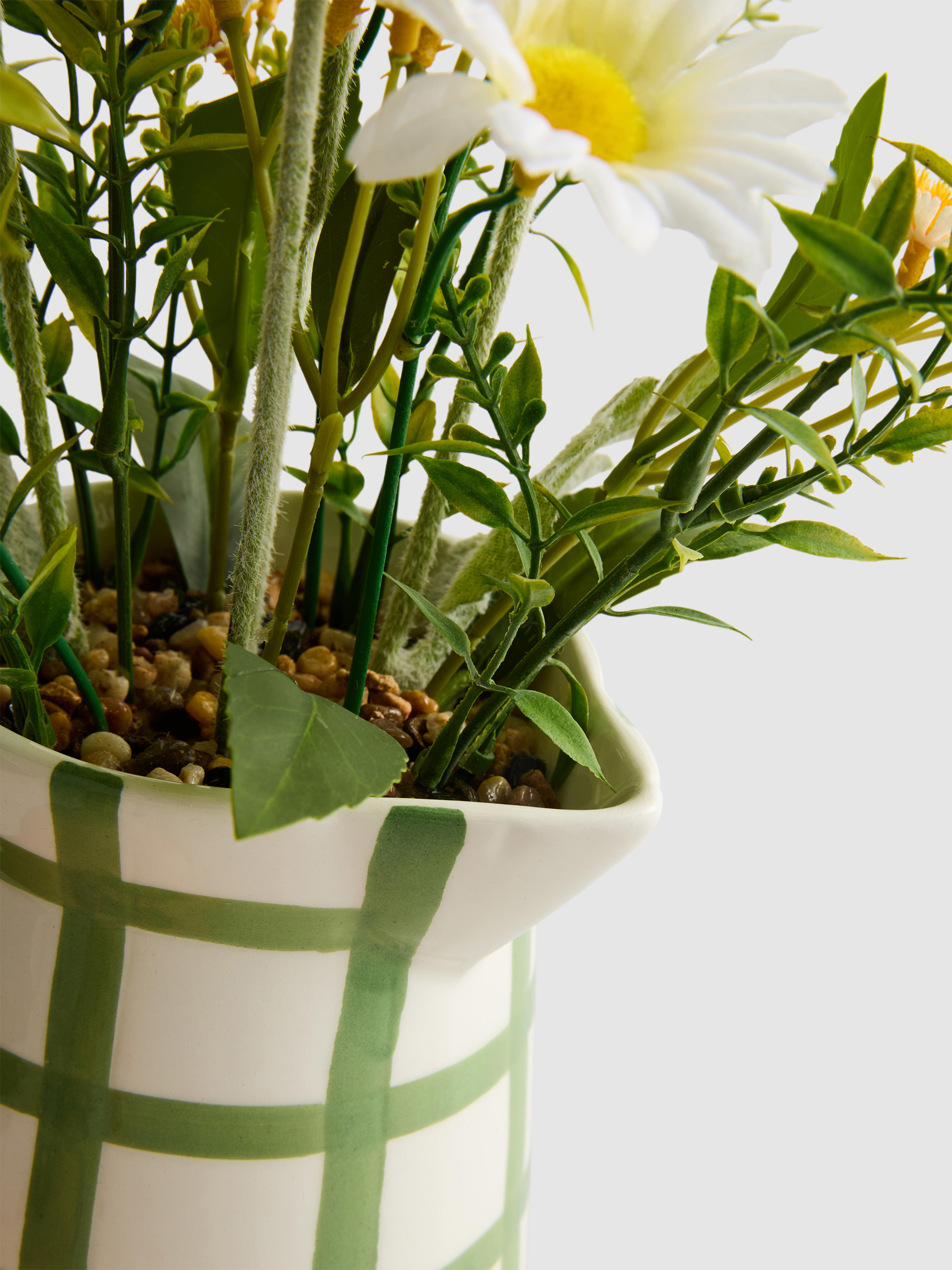 Faux Flower Arrangement In Ceramic Jug