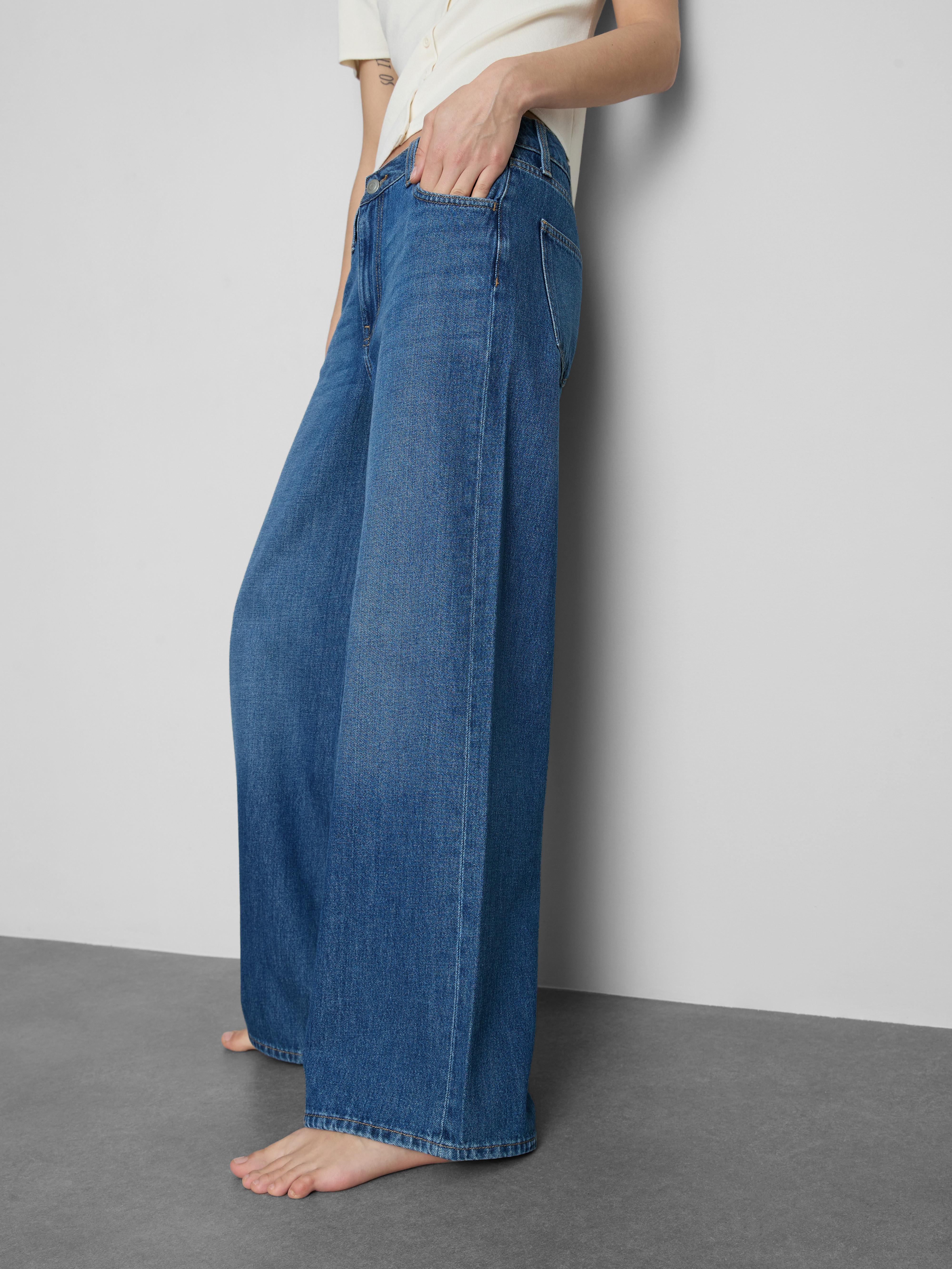 Calças ganga corte largo cintura média algodão