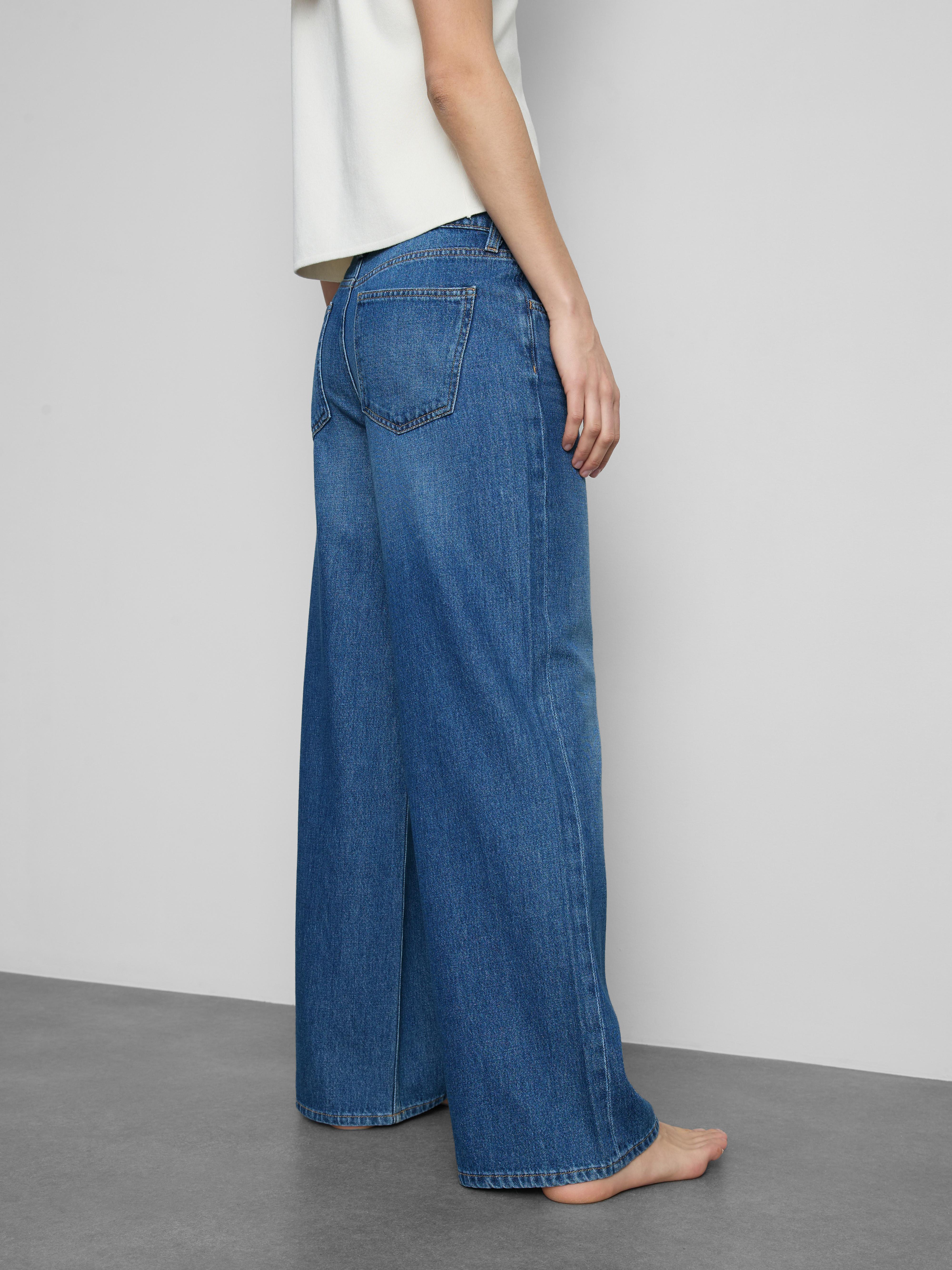 Calças ganga corte largo cintura média algodão