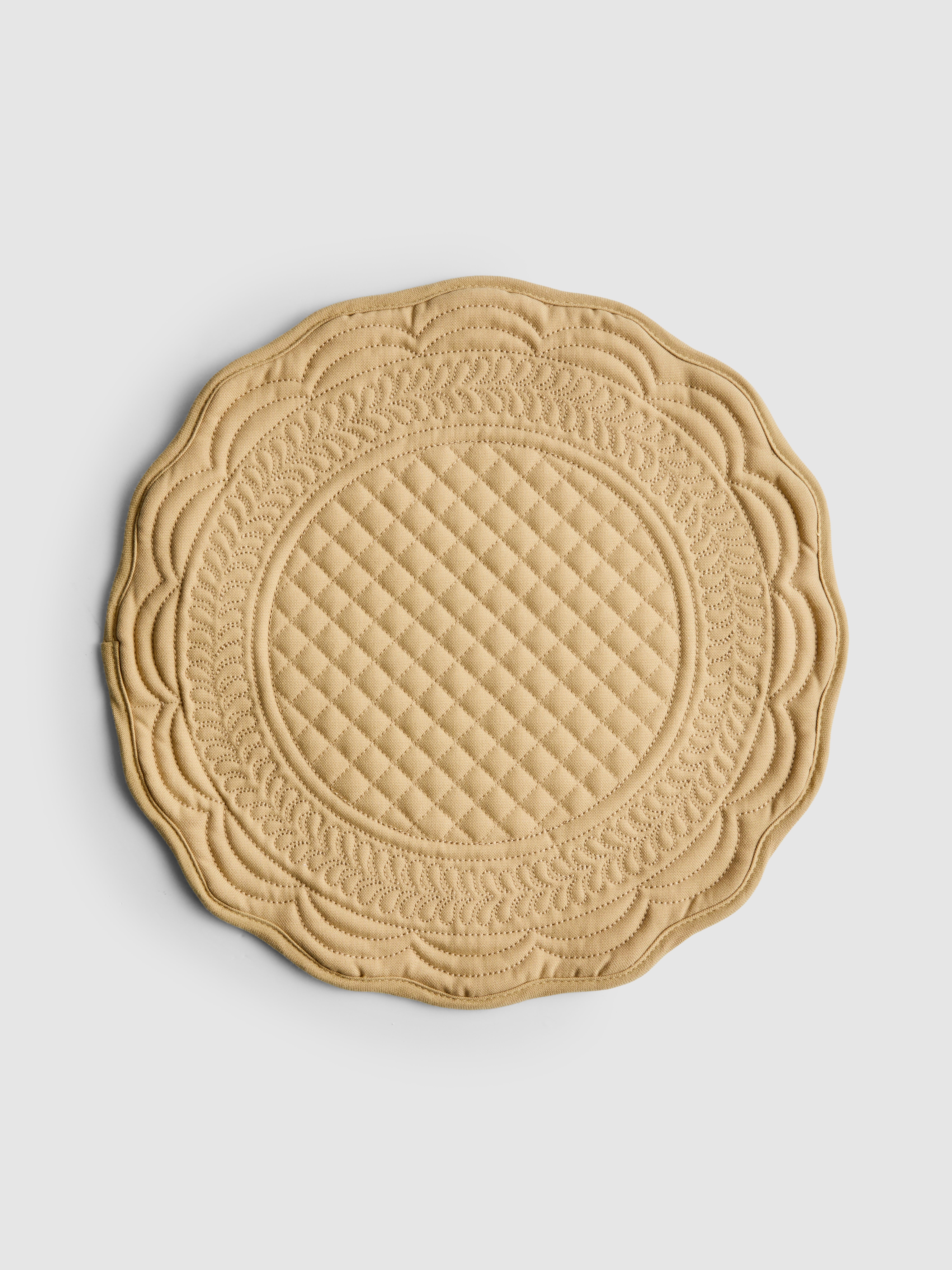 Doorgestikte ronde placemat