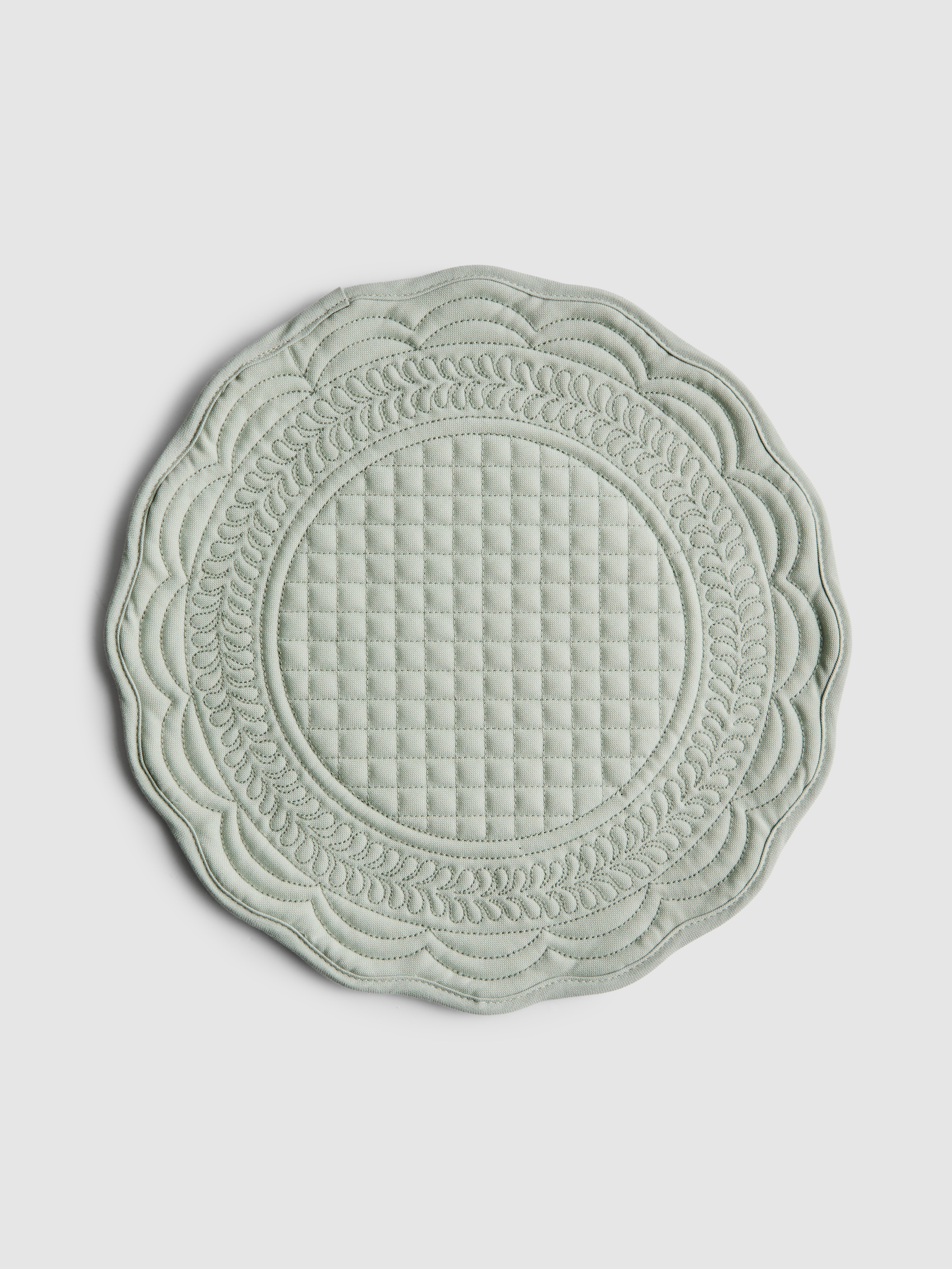 Doorgestikte ronde placemat