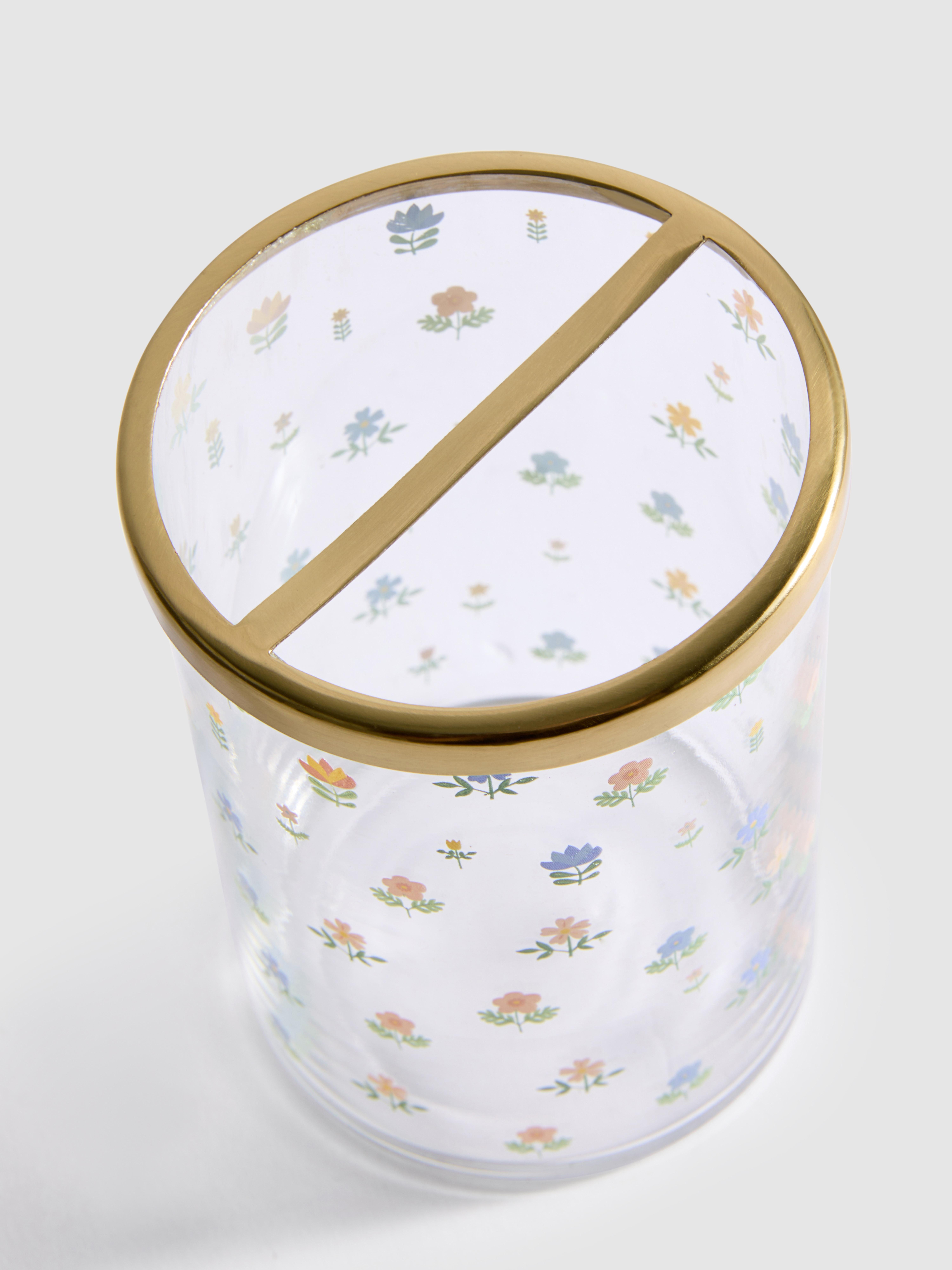 Zahnputzbecher mit Blumenmuster