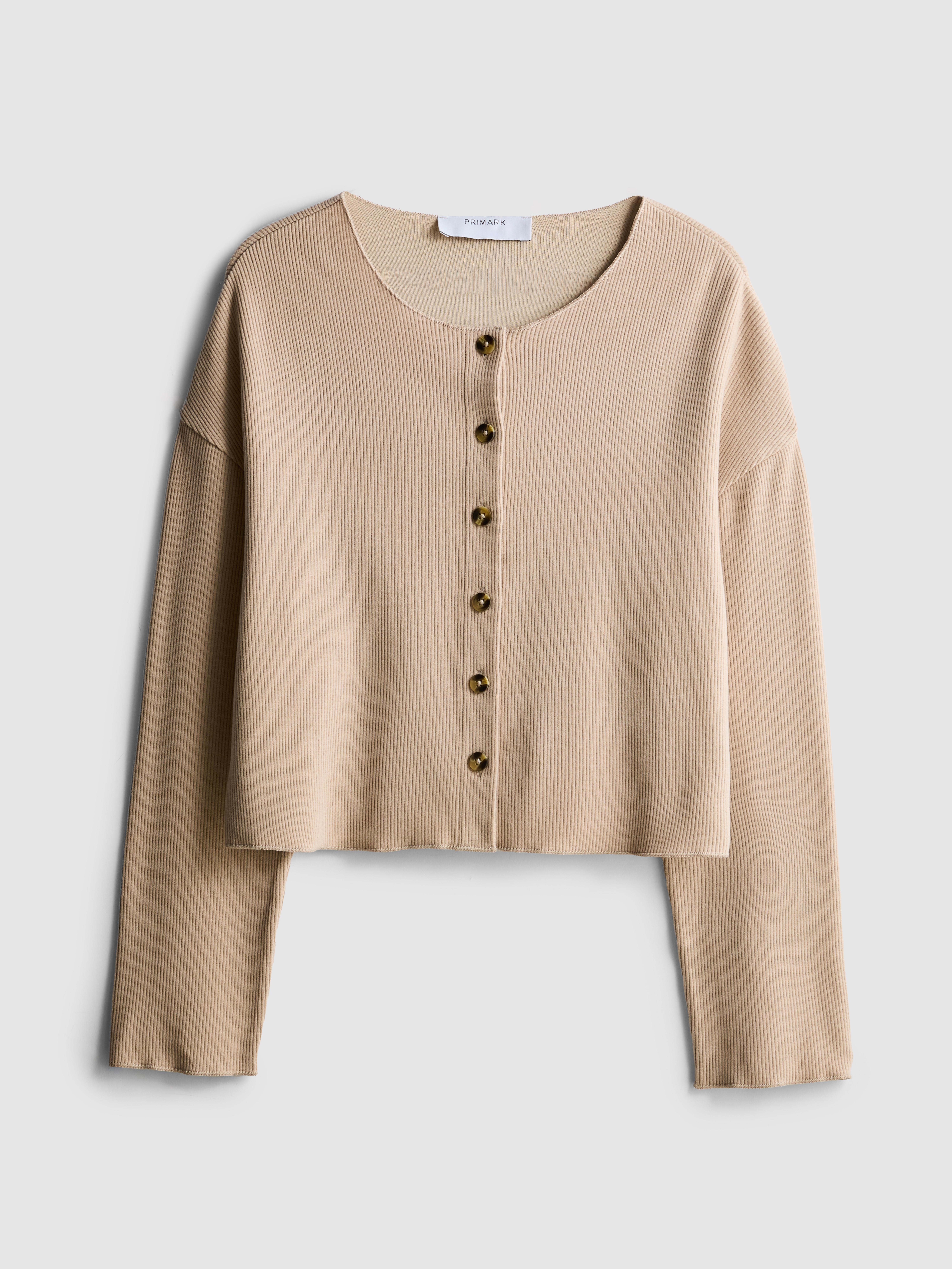 Casaco malha canelada gola redonda