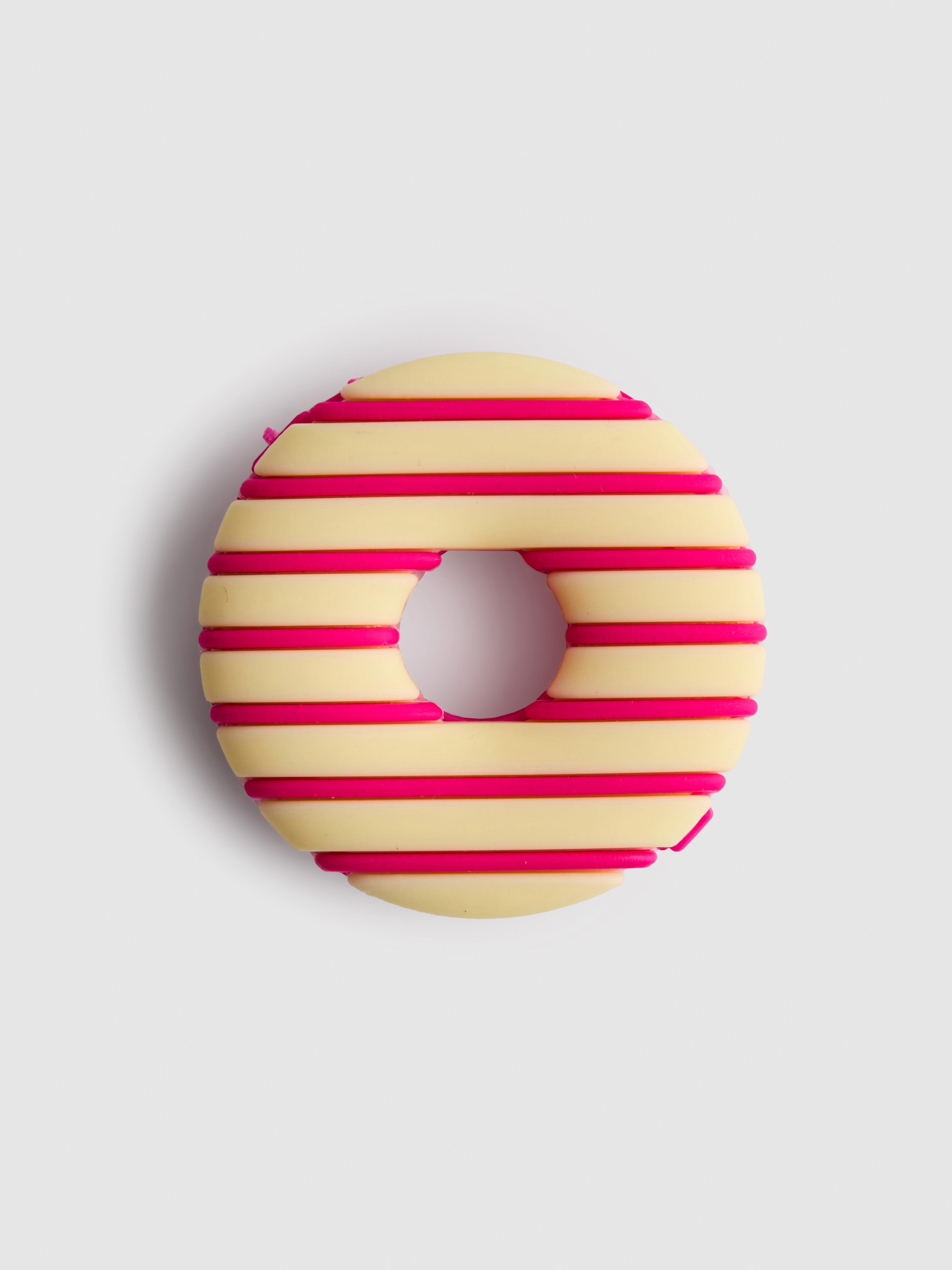 Balzam na pery v tvare farebnej sušienky