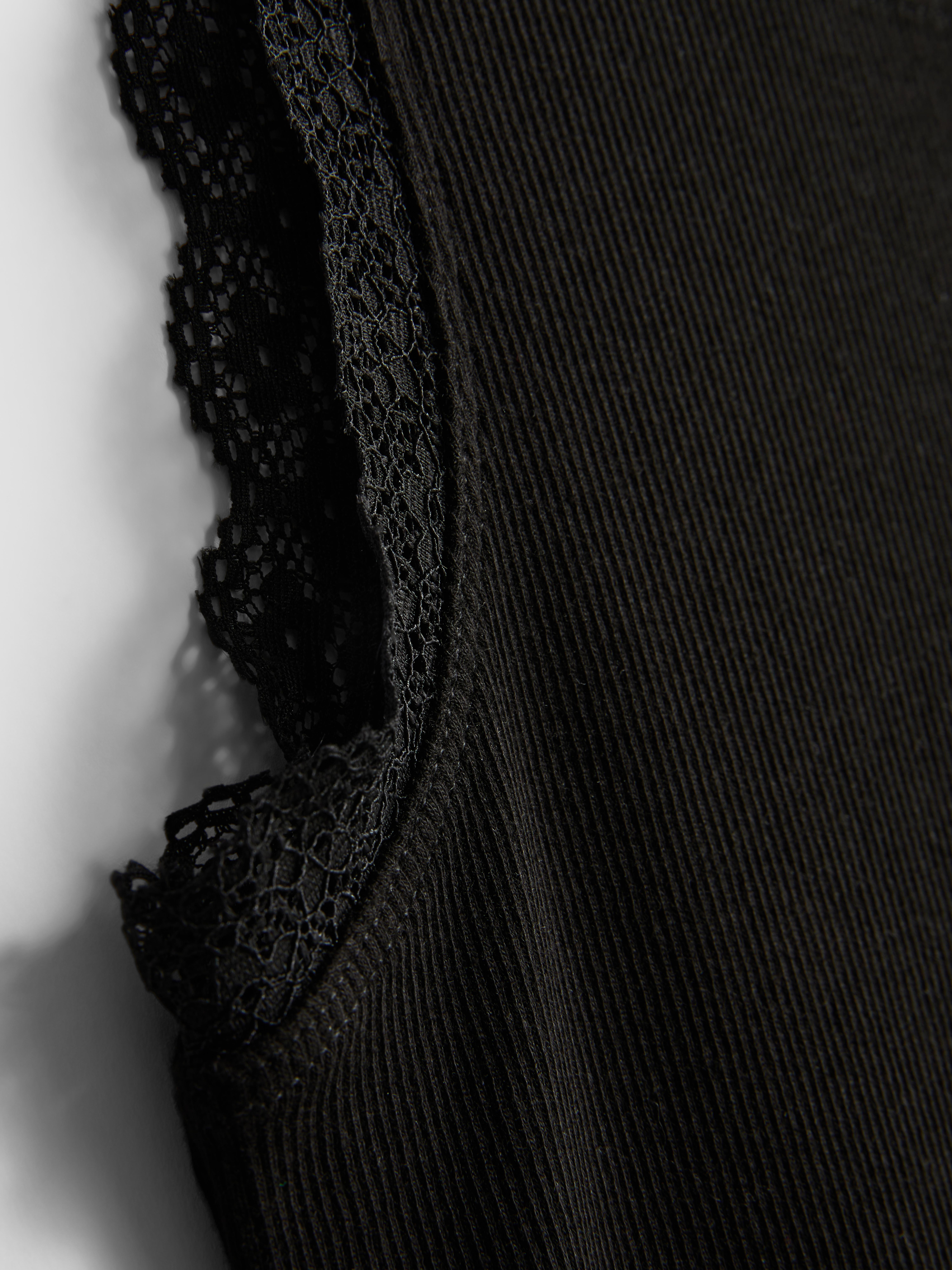 Camiseta sin mangas de algodón con ribetes de encaje
