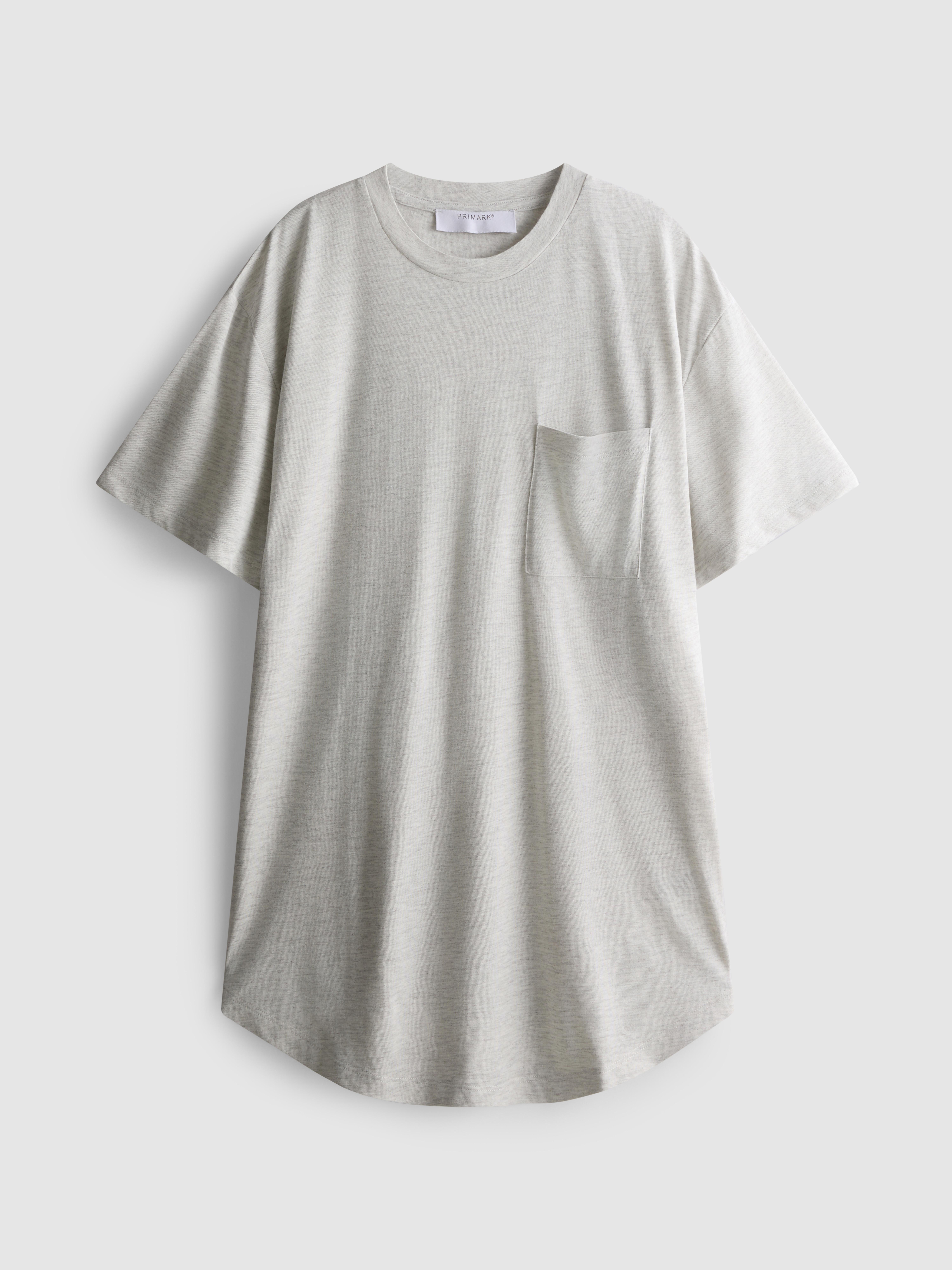 T-shirt comprida bolso aplicado