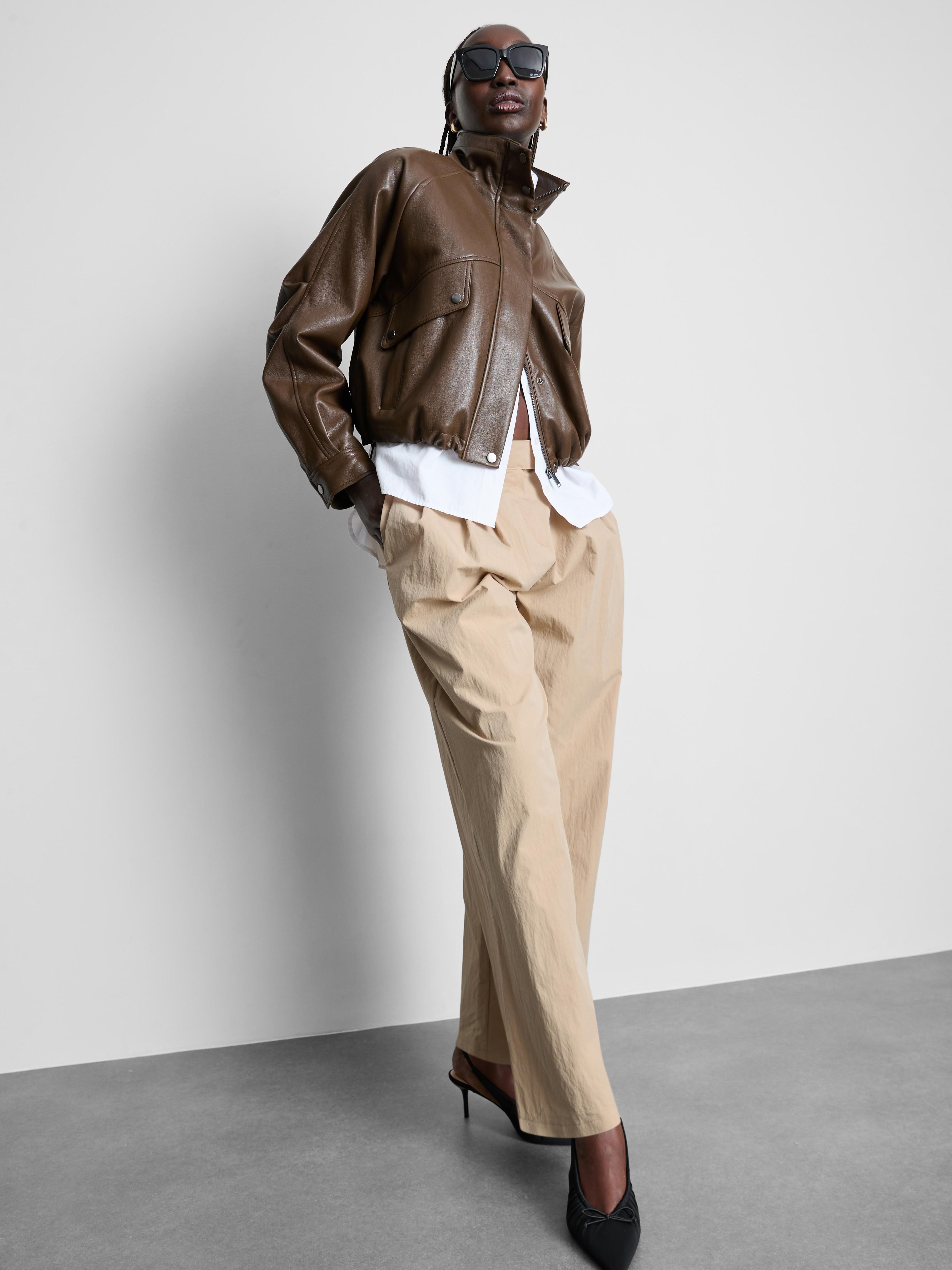 Broek met bandplooien, hoge taille en textuur