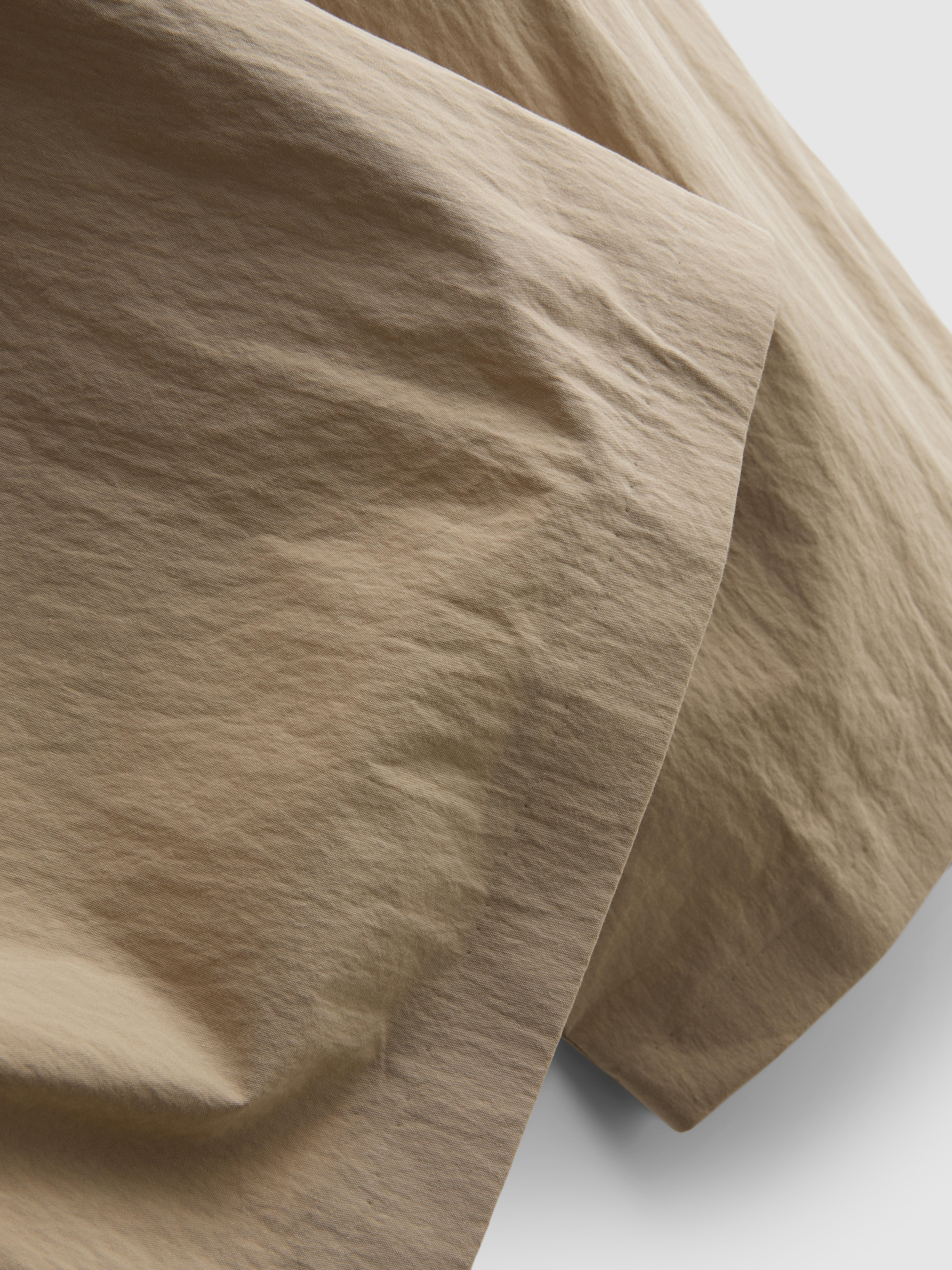 Broek met bandplooien, hoge taille en textuur