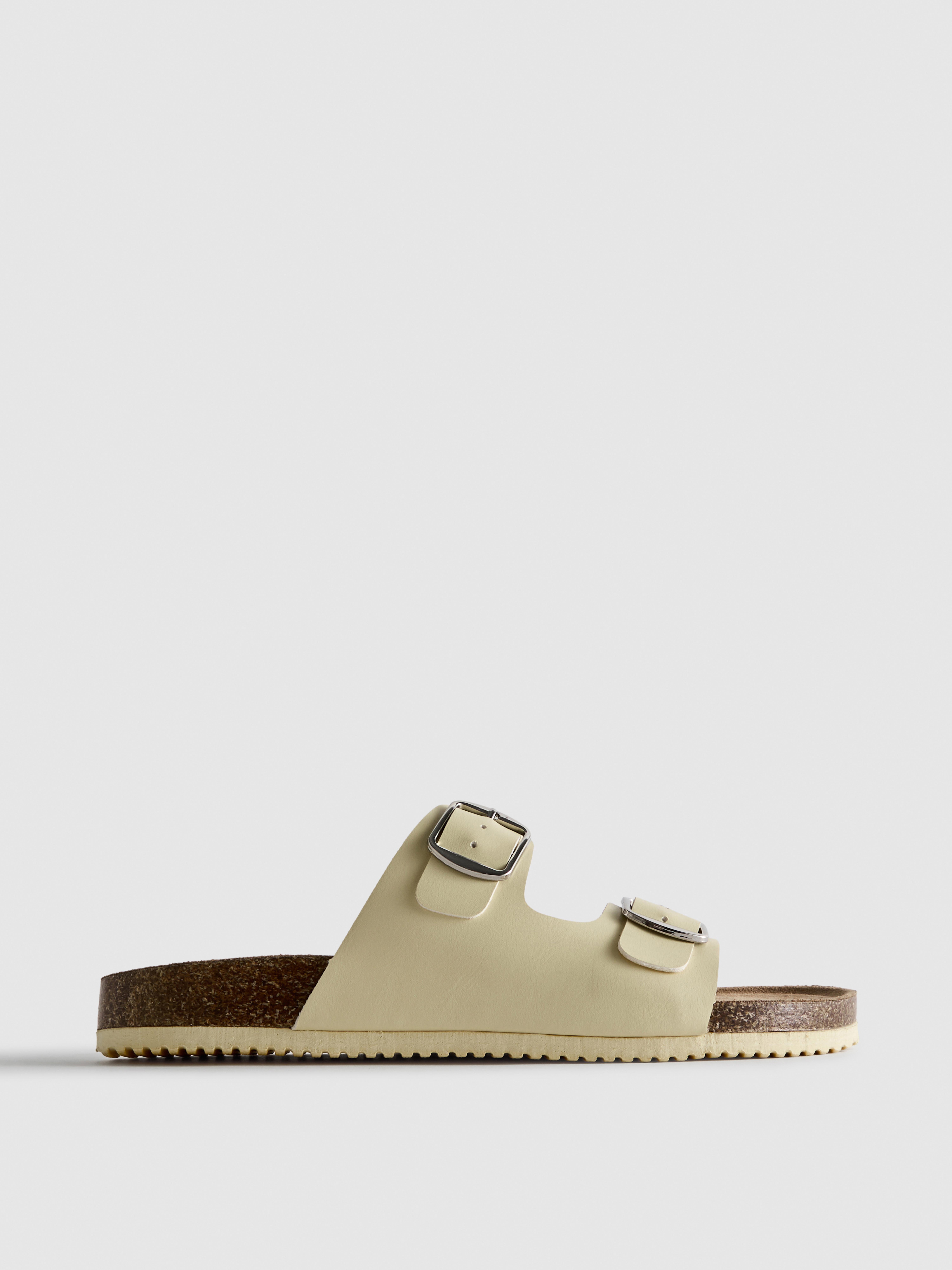 Sandálias tiras duplas fivela