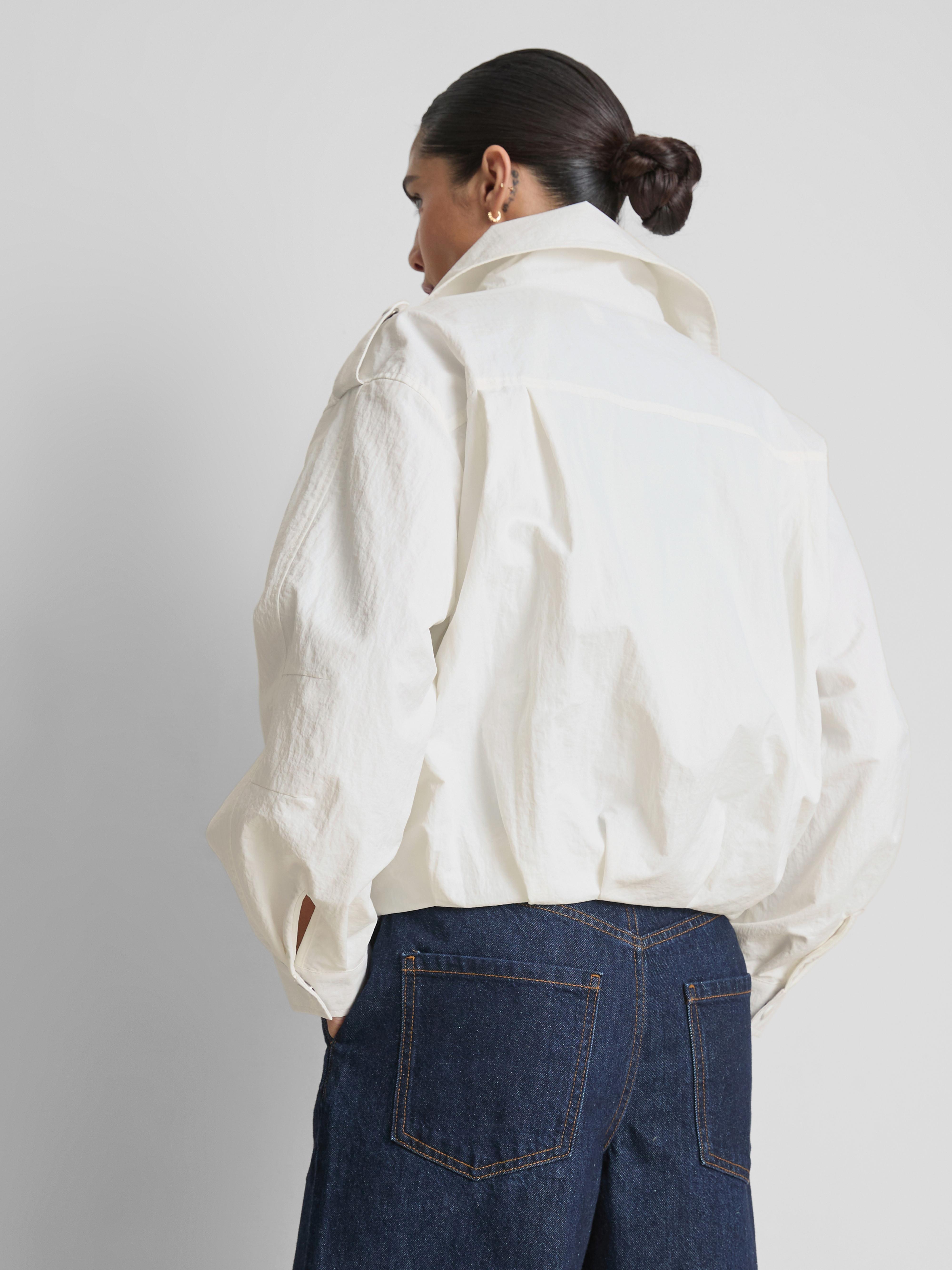 Veste de pluie à poche plaquée Coleen