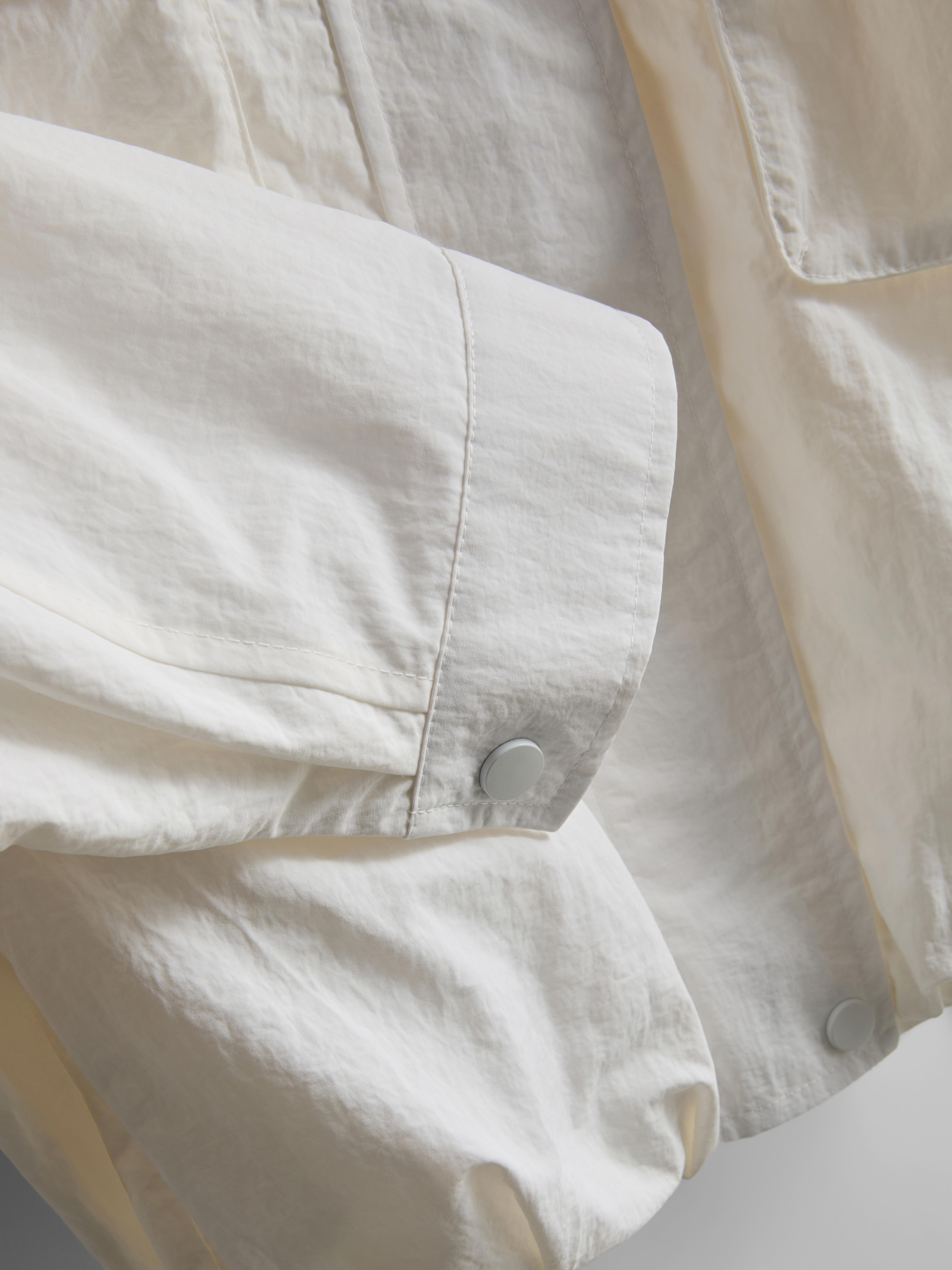 Veste de pluie à poche plaquée Coleen