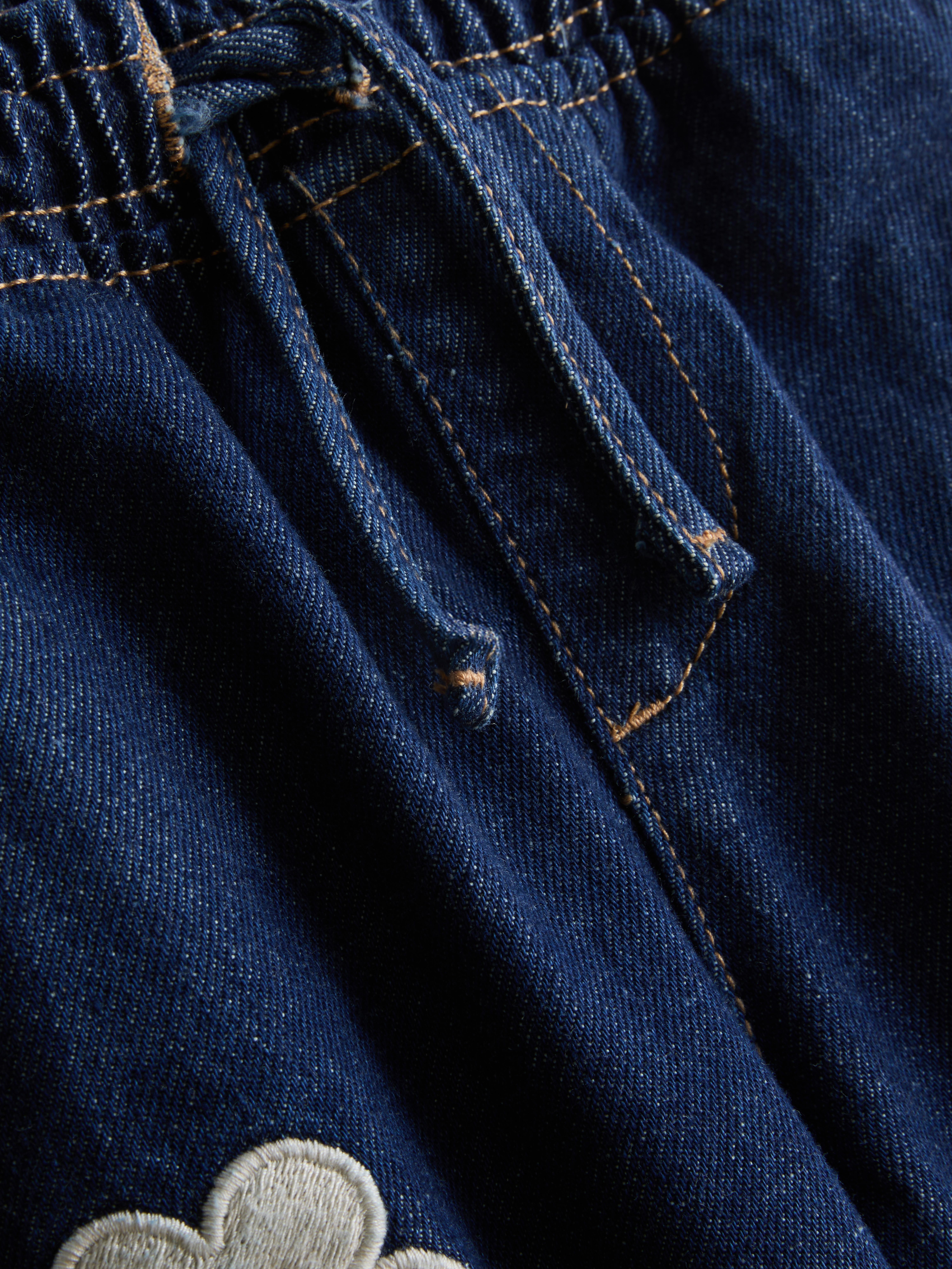 1,5–8 Jahre | „Peanuts Snoopy“ Jeans mit weitem Bein