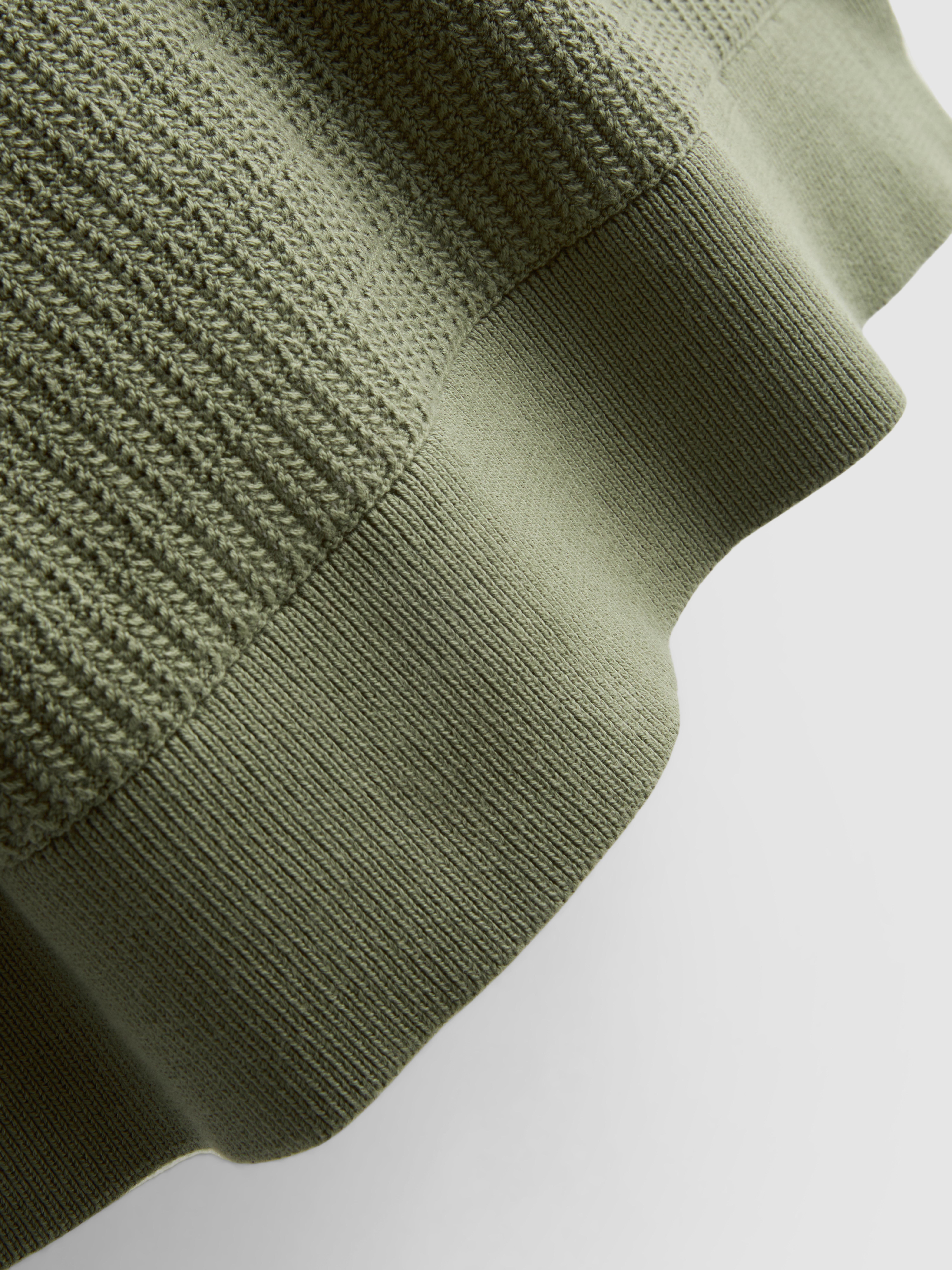 Polo en maille texturée
